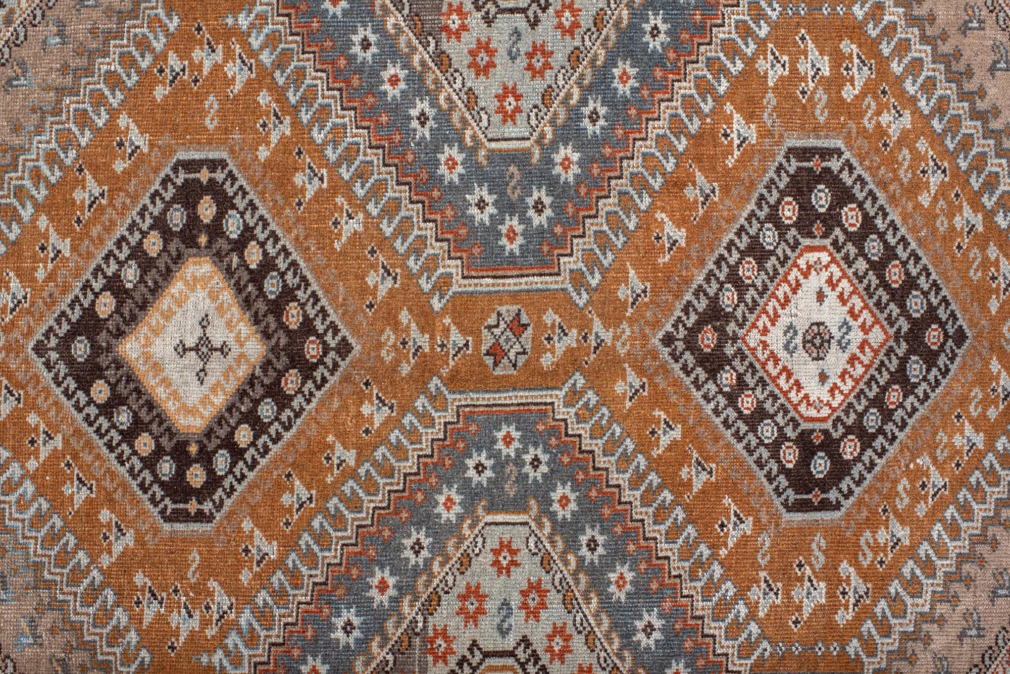 Hand-Knotted Vintage Khamseh Shirz Small Carpet with a Rusty Field with Star and Dot Motives For Sale