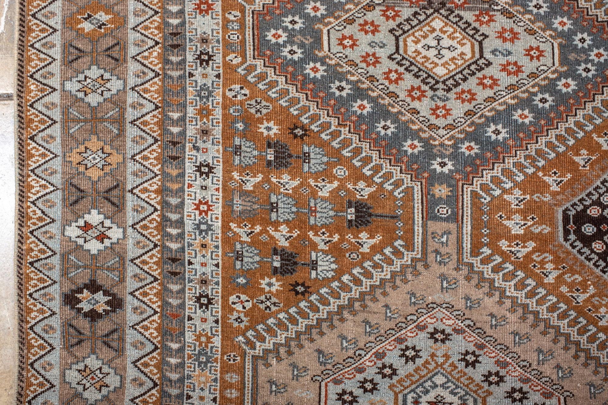 Vintage Khamseh Shirz Small Carpet with a Rusty Field with Star and Dot Motives In Good Condition For Sale In New York, NY