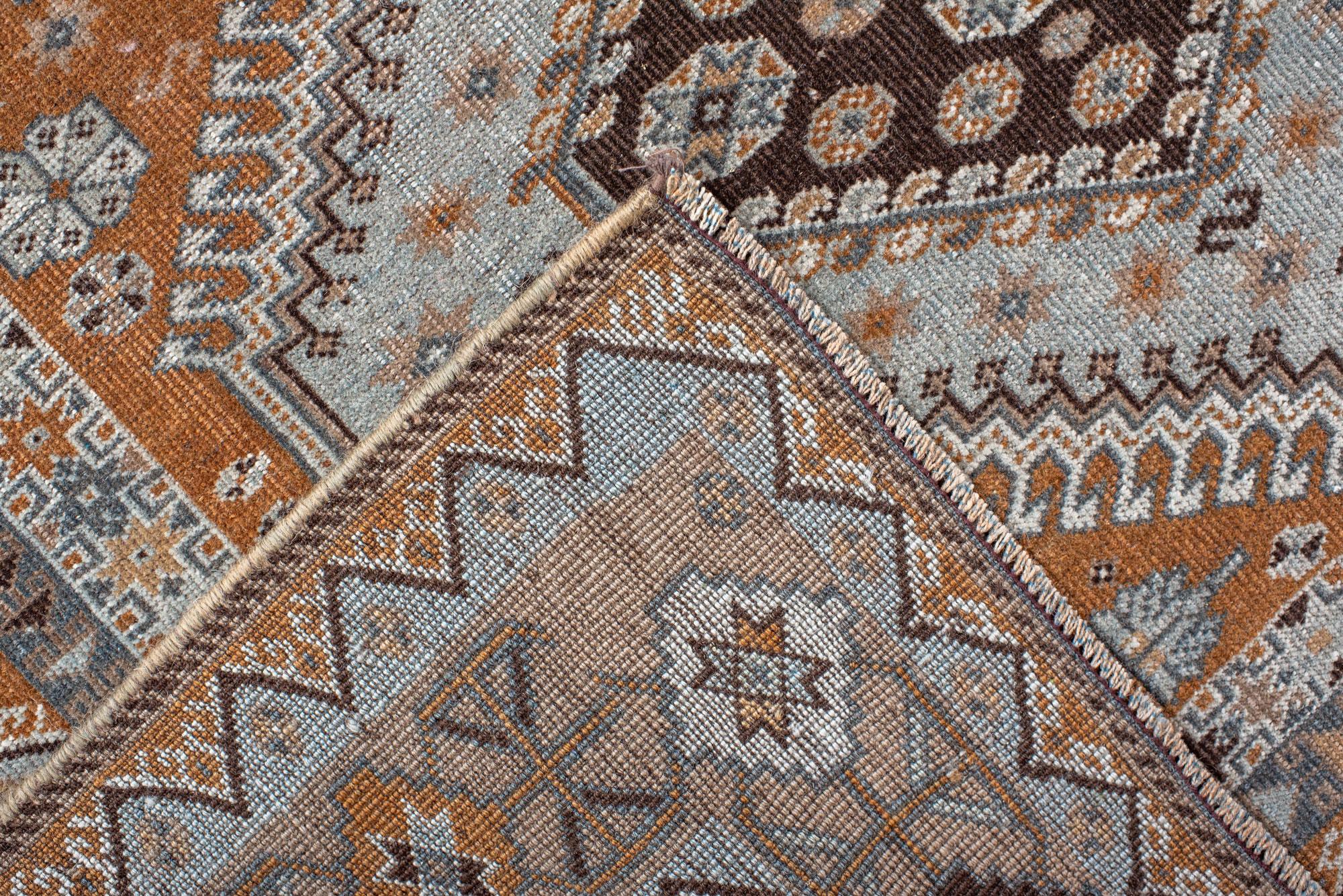 Wool Vintage Khamseh Shirz Small Carpet with a Rusty Field with Star and Dot Motives For Sale