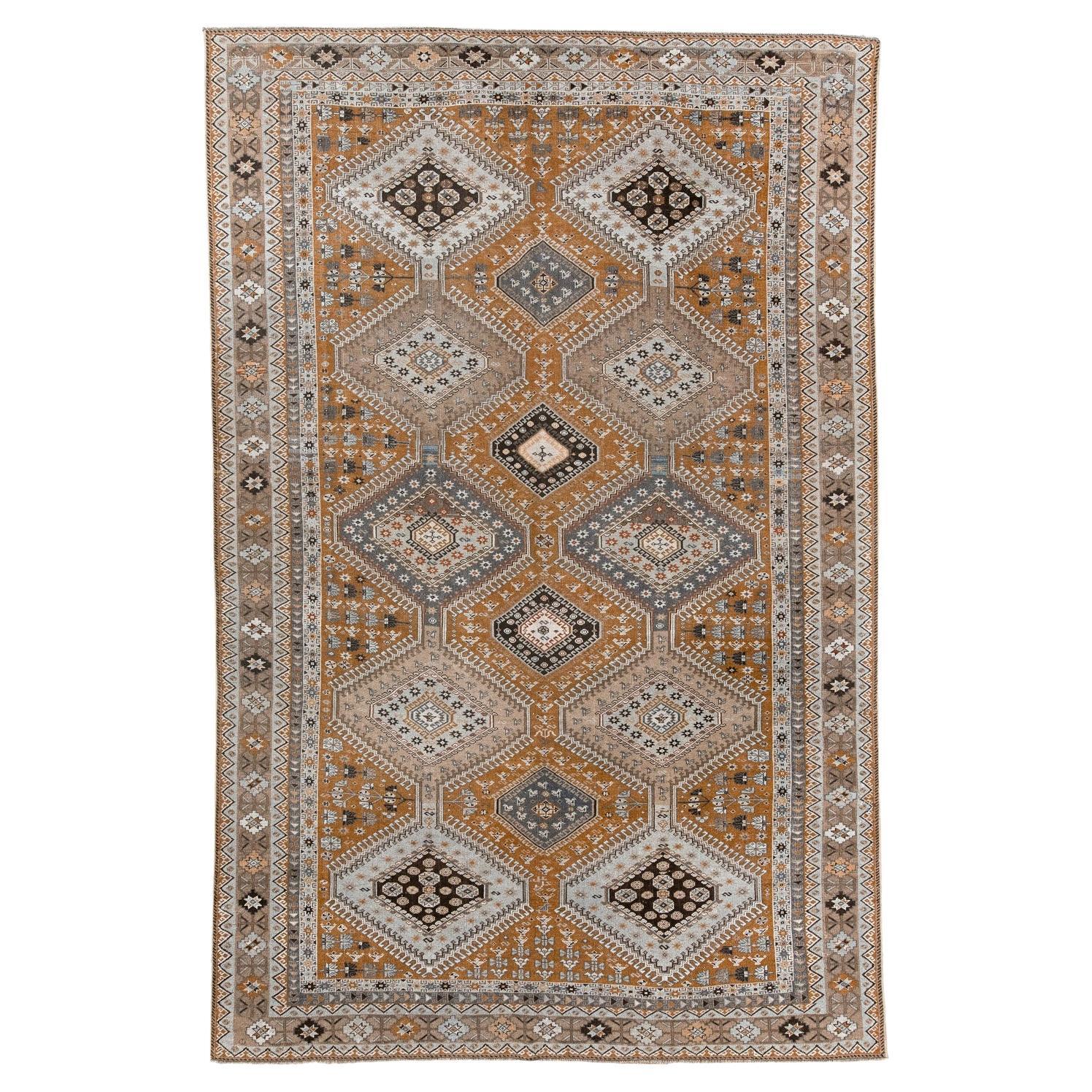 Vintage Khamseh Shirz Small Carpet with a Rusty Field with Star and Dot Motives For Sale