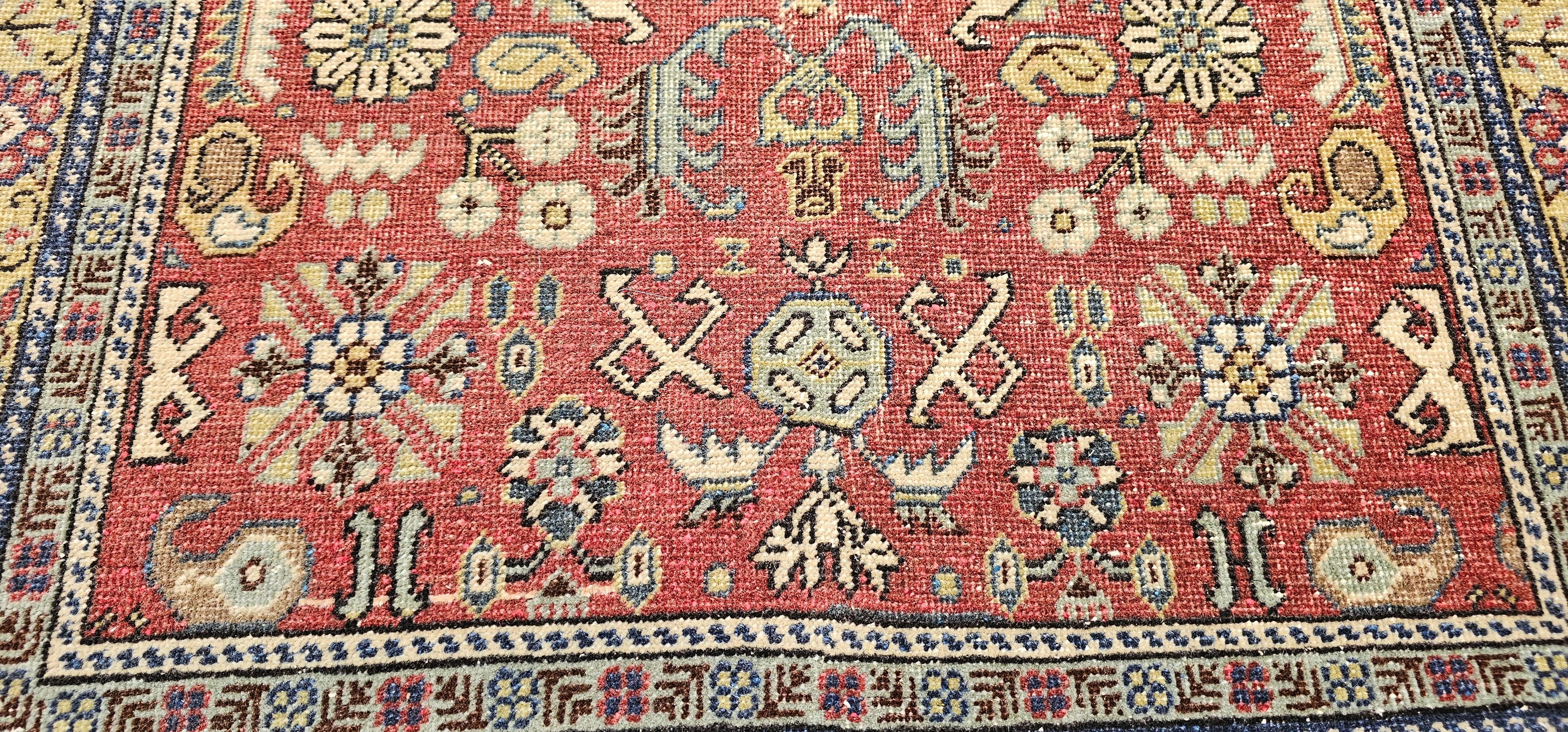 Lana Tappeto vintage Khotan con motivo geometrico alllover su rosso mattone, giallo e avorio in vendita