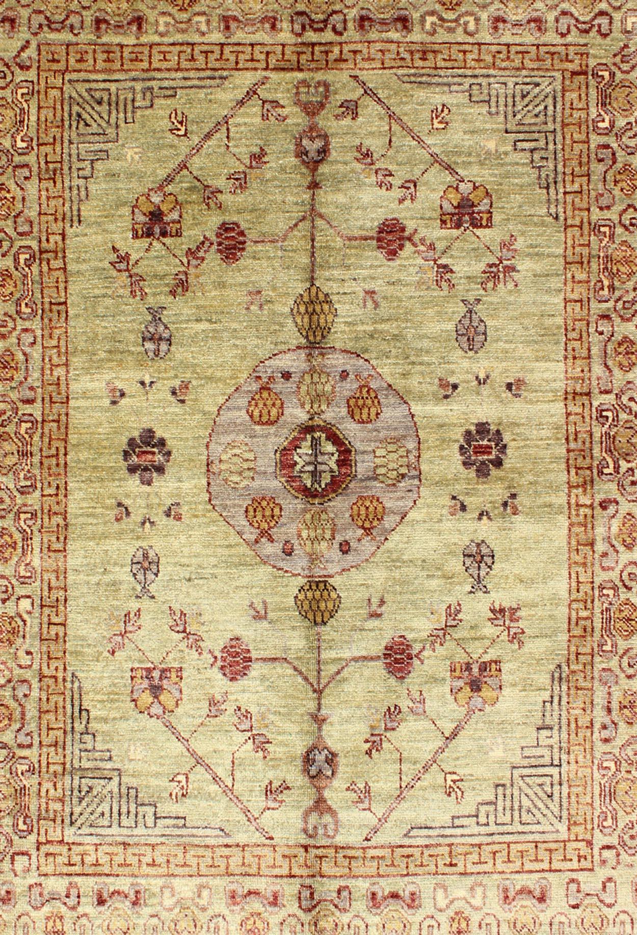 Afghan Vintage Khotan Design Rug with Circular Medallion on Light Pistachio Green For Sale