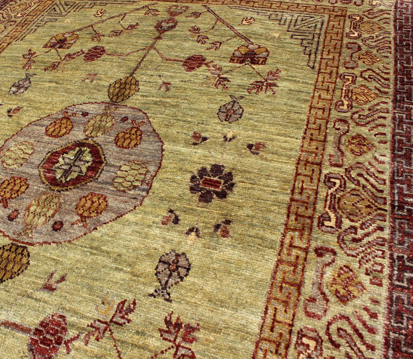 Vintage Khotan Design Rug with Circular Medallion on Light Pistachio Green In Excellent Condition For Sale In Atlanta, GA