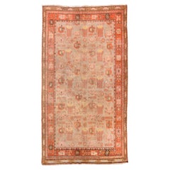 Vintage Khotan Long Rug with A Tan Field and A Coral Border