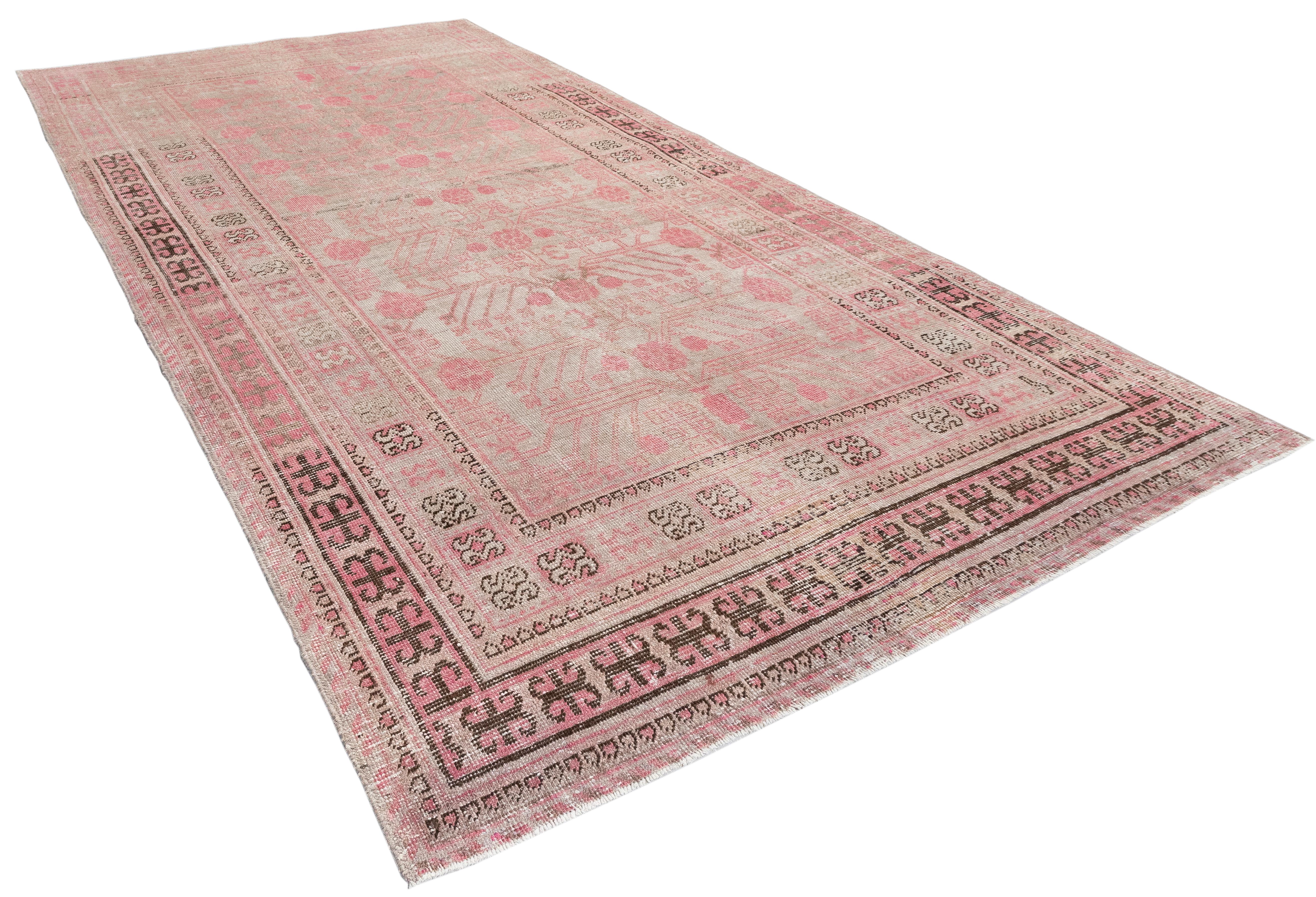 Vintage Khotan Rug from Uzbekistan – 80-Year-Old Organic Dyed Beauty In Distressed Condition For Sale In New York, NY