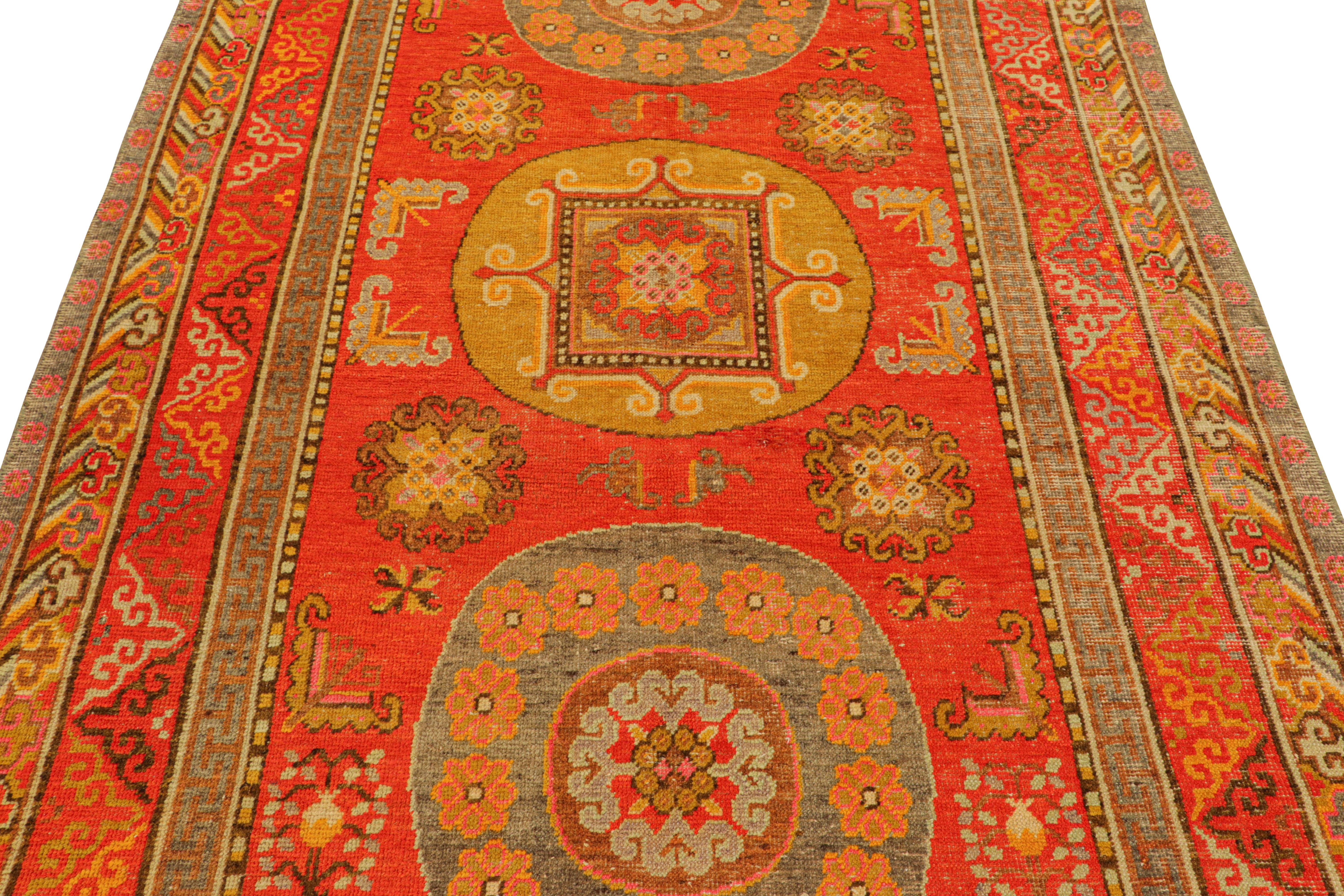 East Turkestani Vintage Khotan Rug in Red, with Medallions and Buddhist Motifs, from Rug & Kilim For Sale