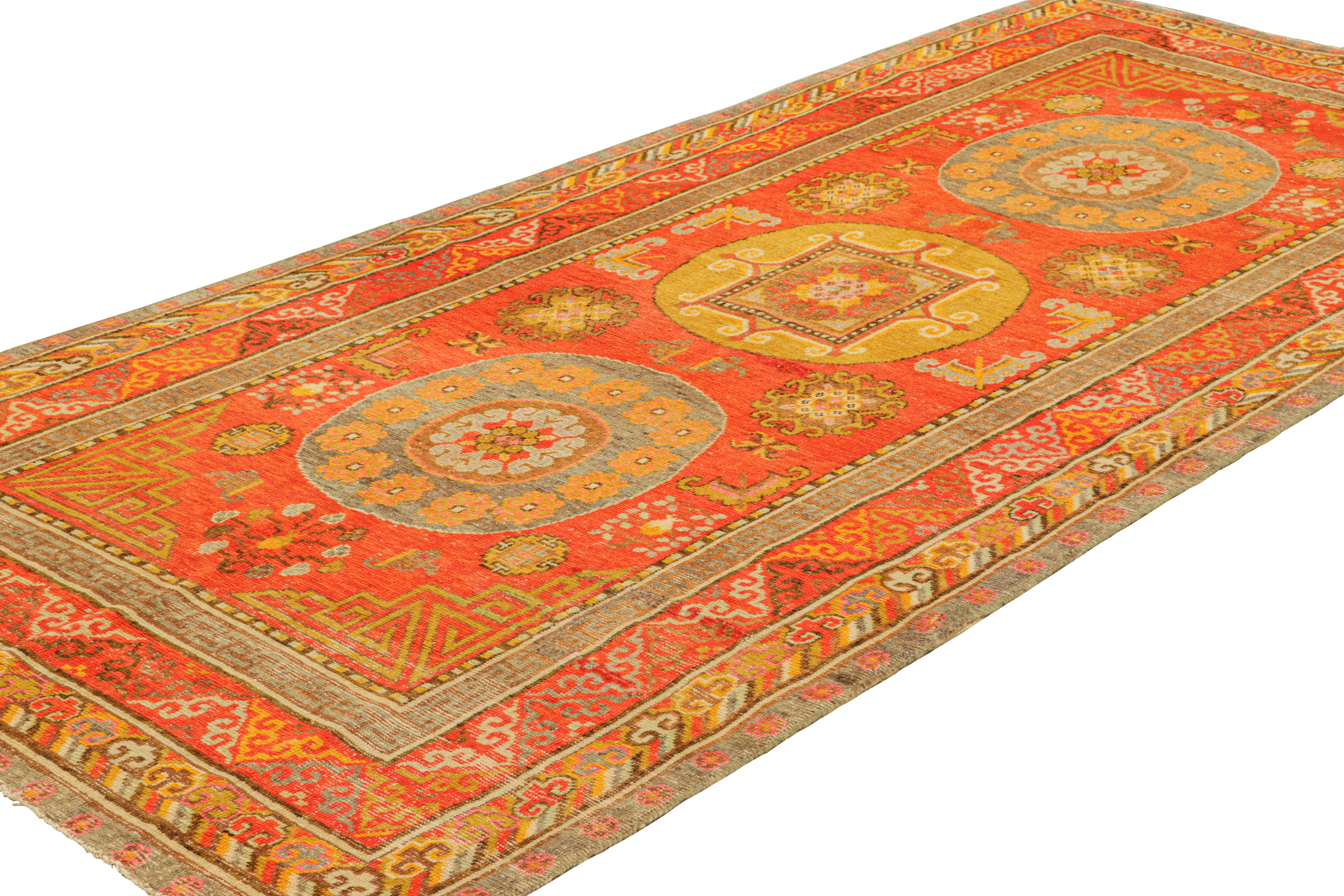 Hand-Knotted Vintage Khotan Rug in Red, with Medallions and Buddhist Motifs, from Rug & Kilim For Sale