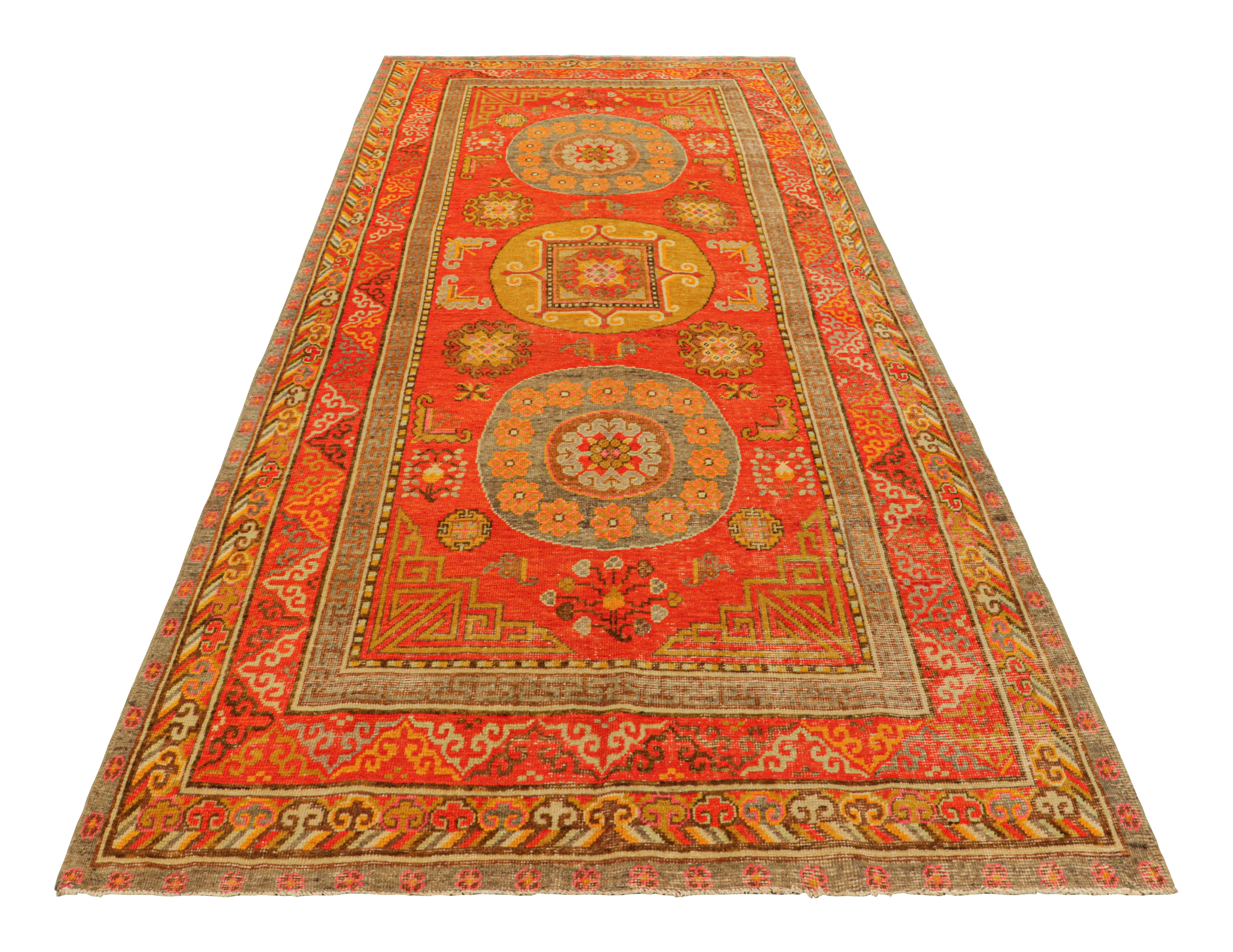 Vintage Khotan Rug in Red, with Medallions and Buddhist Motifs, from Rug & Kilim In Good Condition For Sale In Long Island City, NY