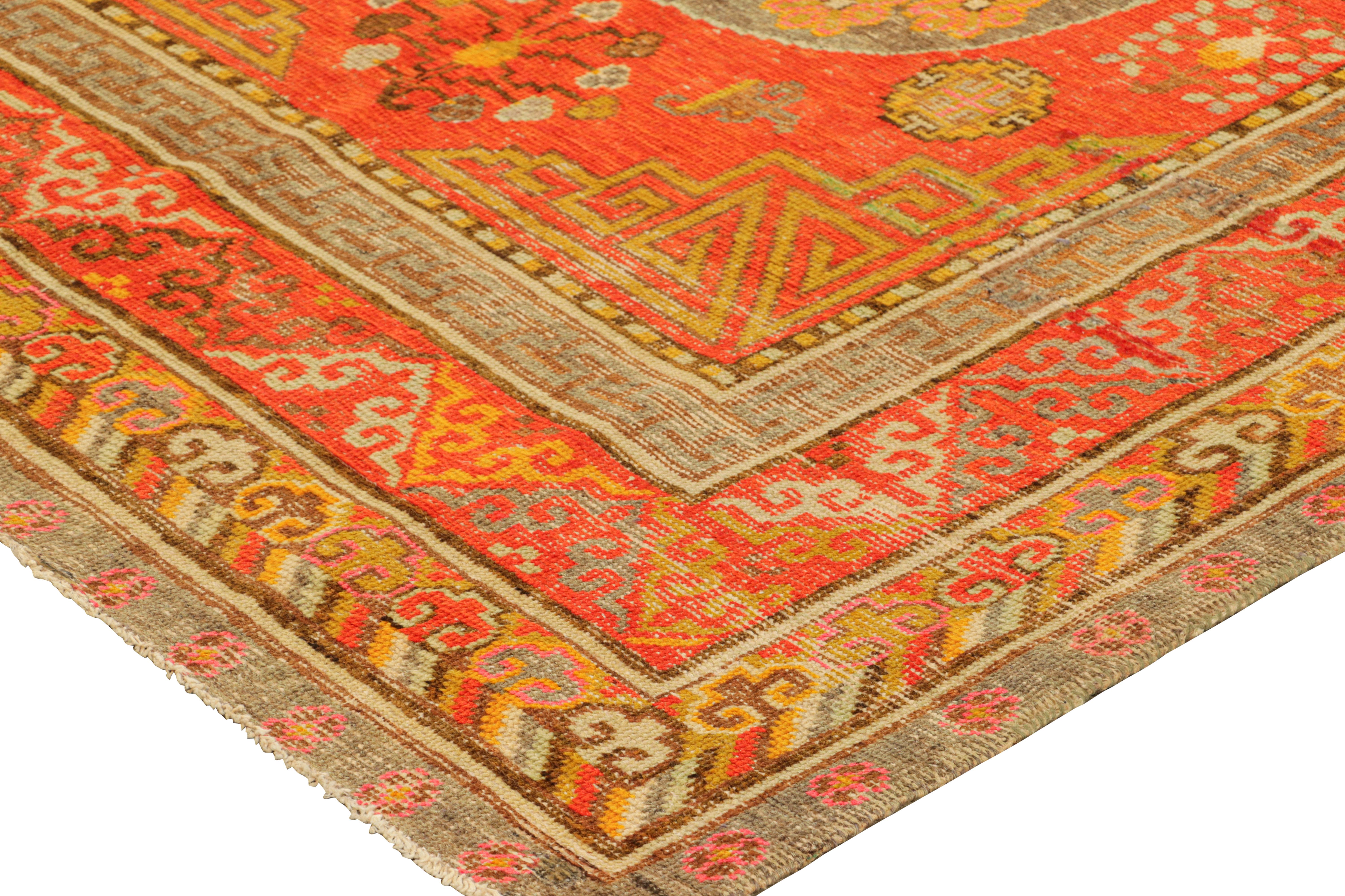 Mid-20th Century Vintage Khotan Rug in Red, with Medallions and Buddhist Motifs, from Rug & Kilim For Sale
