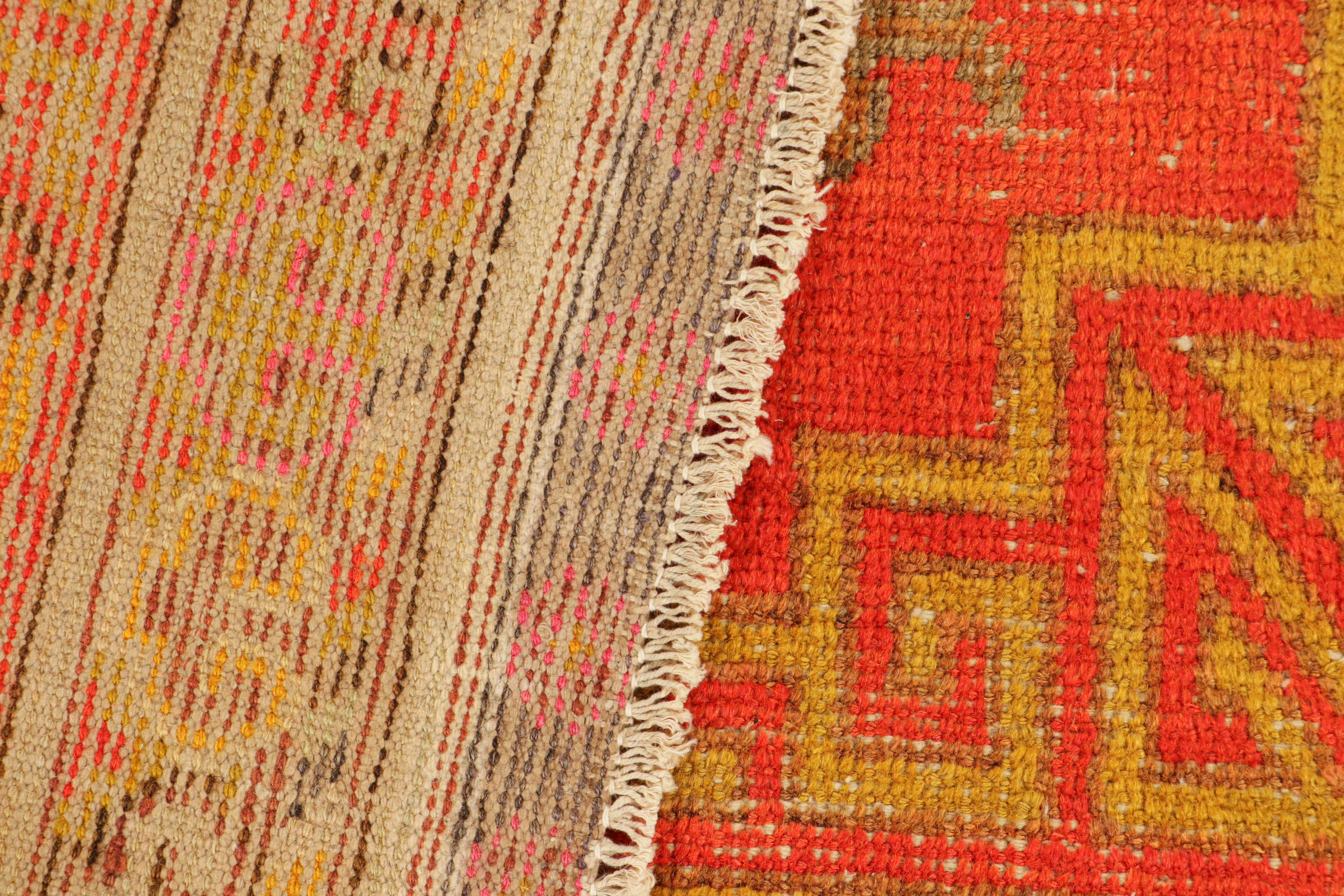 Wool Vintage Khotan Rug in Red, with Medallions and Buddhist Motifs, from Rug & Kilim For Sale