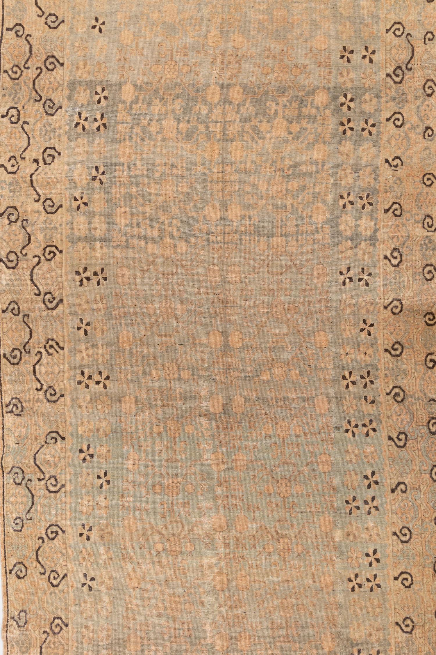 Vintage Khotan Rug in neutral colors. Perfect gallery size and a good addition to every room. 