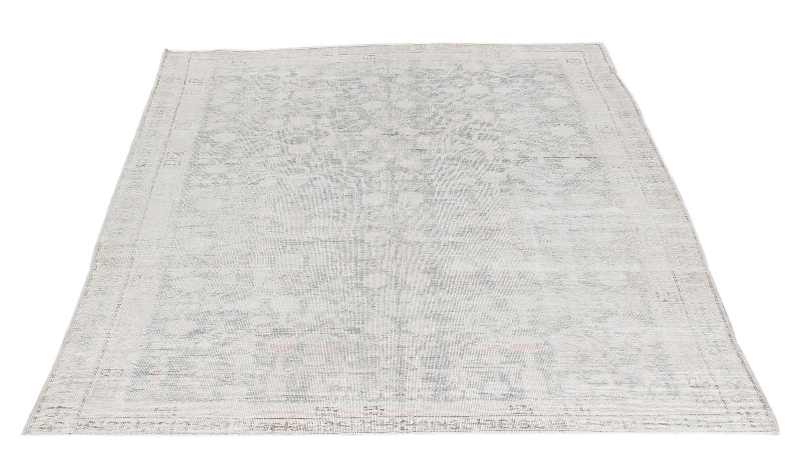 Khotan rugs are produced in East Turkestan and are interchangeably referred to as Samarkand rugs due to their close proximity to the cultural city center of the same name. Khotan rugs are distinguished by their geometric patterns ranging from soft