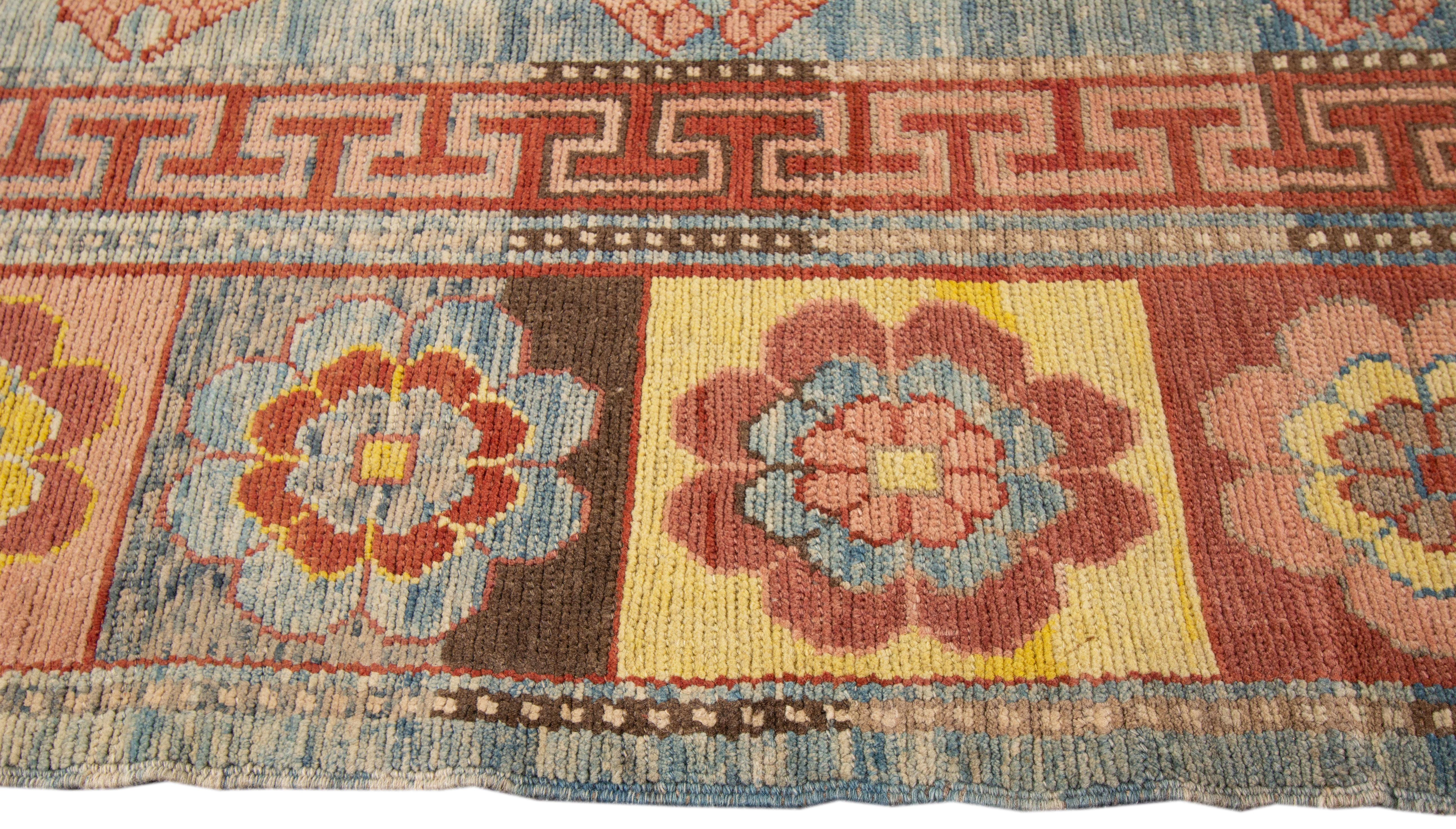 Hand-Knotted Vintage Khotan Style Tribal Wool Rug For Sale