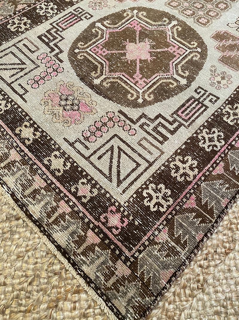Orgin: Mongolia
Dimensions: 4' x 7’8?
Age: 1950’s
Design: Khotan
Material: 100% Wool-pile
Color: Taupe, Brown, Pink, Light Grey

10188

An epitome of history, character and culture, Antique Khotan rugs add richness to a room. Produced in