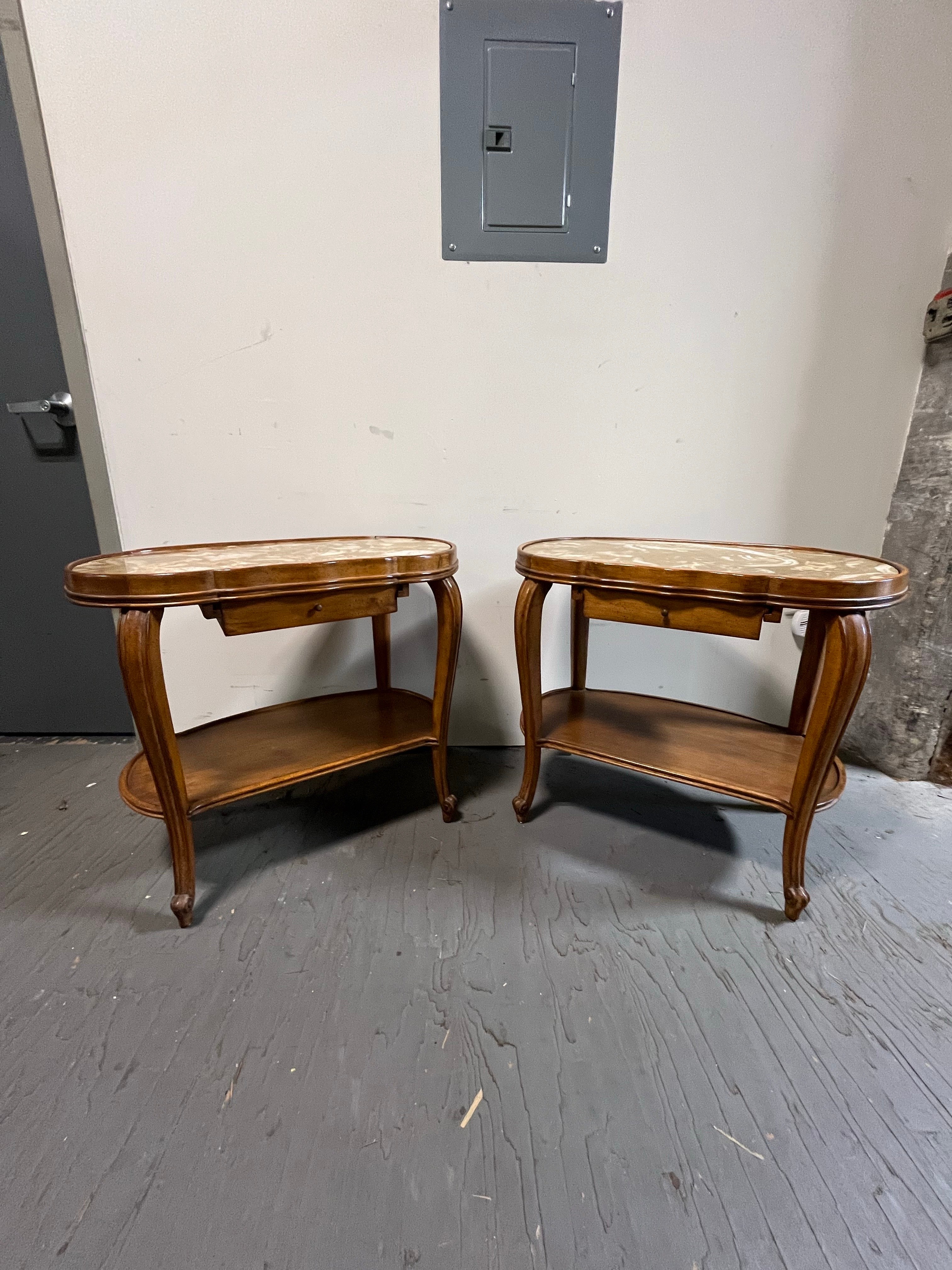 Beautiful kidney shaped nightstand by Danby. Marble top inserts. Single floating drawer. Very elegant.
Curbside to NYC/Philly $450