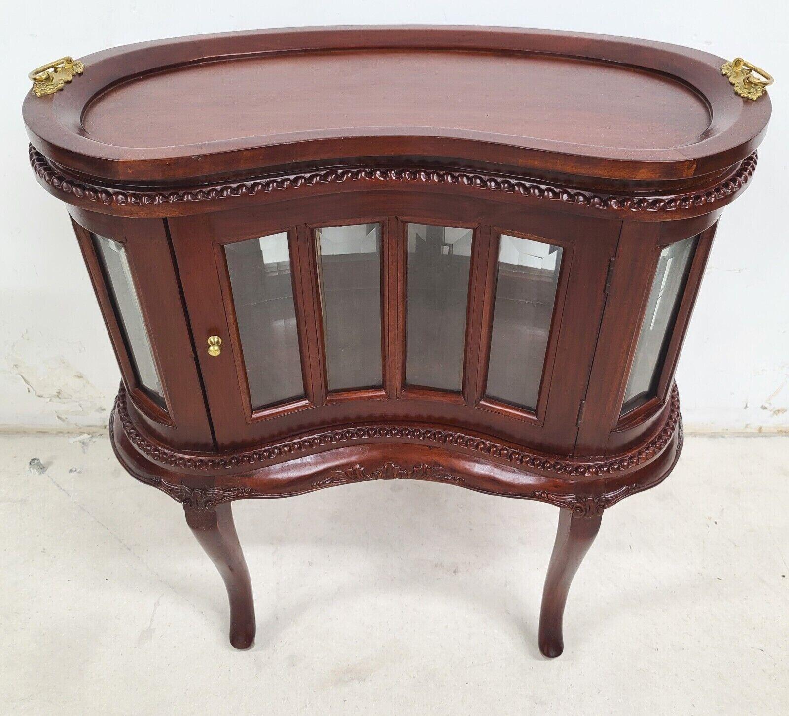 For FULL item description be sure to click on CONTINUE READING at the bottom of this listing.

Offering One Of Our Recent Palm Beach Estate Fine Furniture Acquisitions Of A 
Vintage Kidney Shaped Mahogany Dry Bar with Serving Tray
Featuring beveled