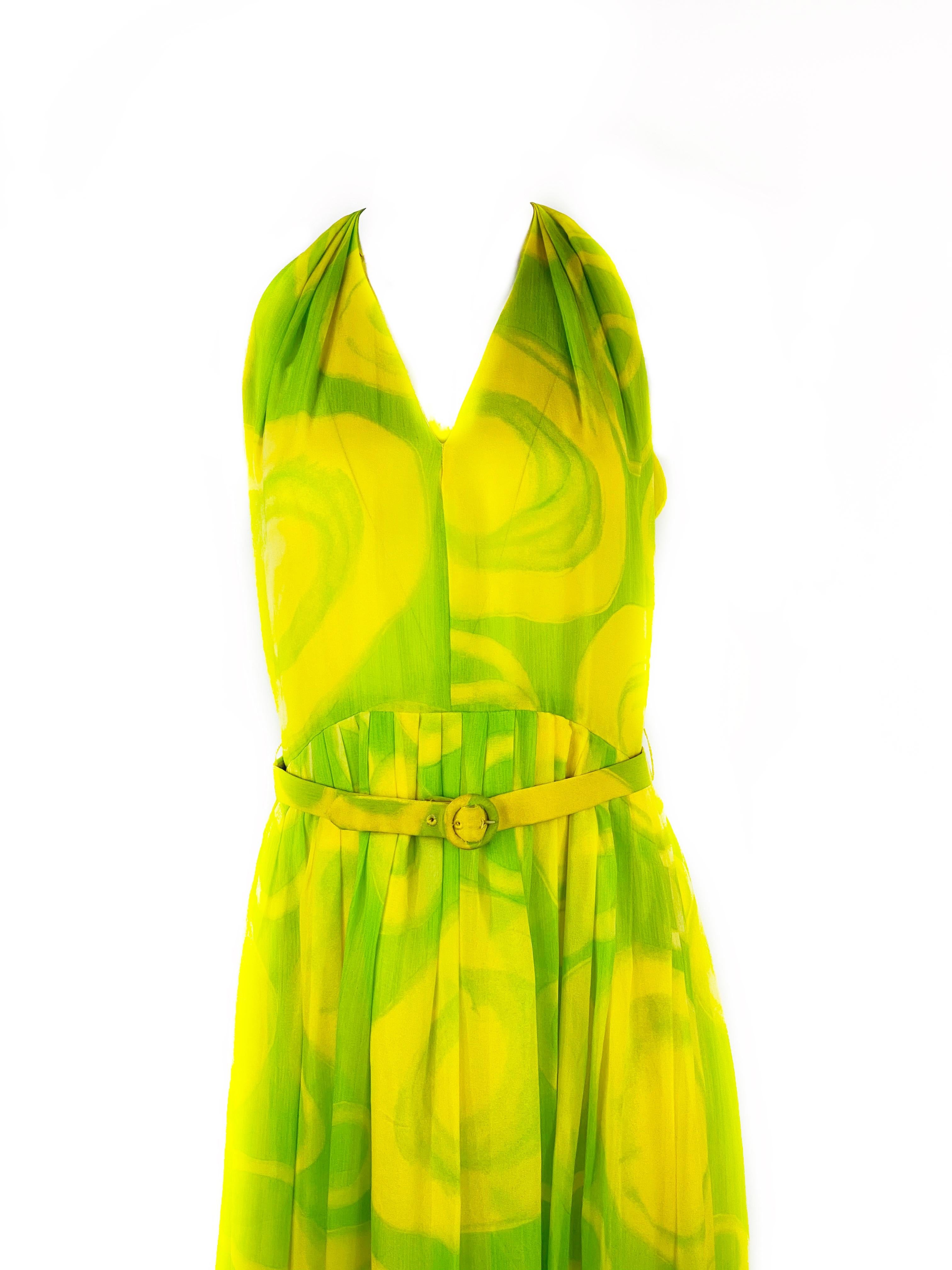 Product details:
Yellow and green geometric, abstract, circle pattern
Featuring v- neck cut out, and belt details
Sleeveless 
Floor length 
Rear zip and two hooks closure
Neiman Marcus
Made in USA
