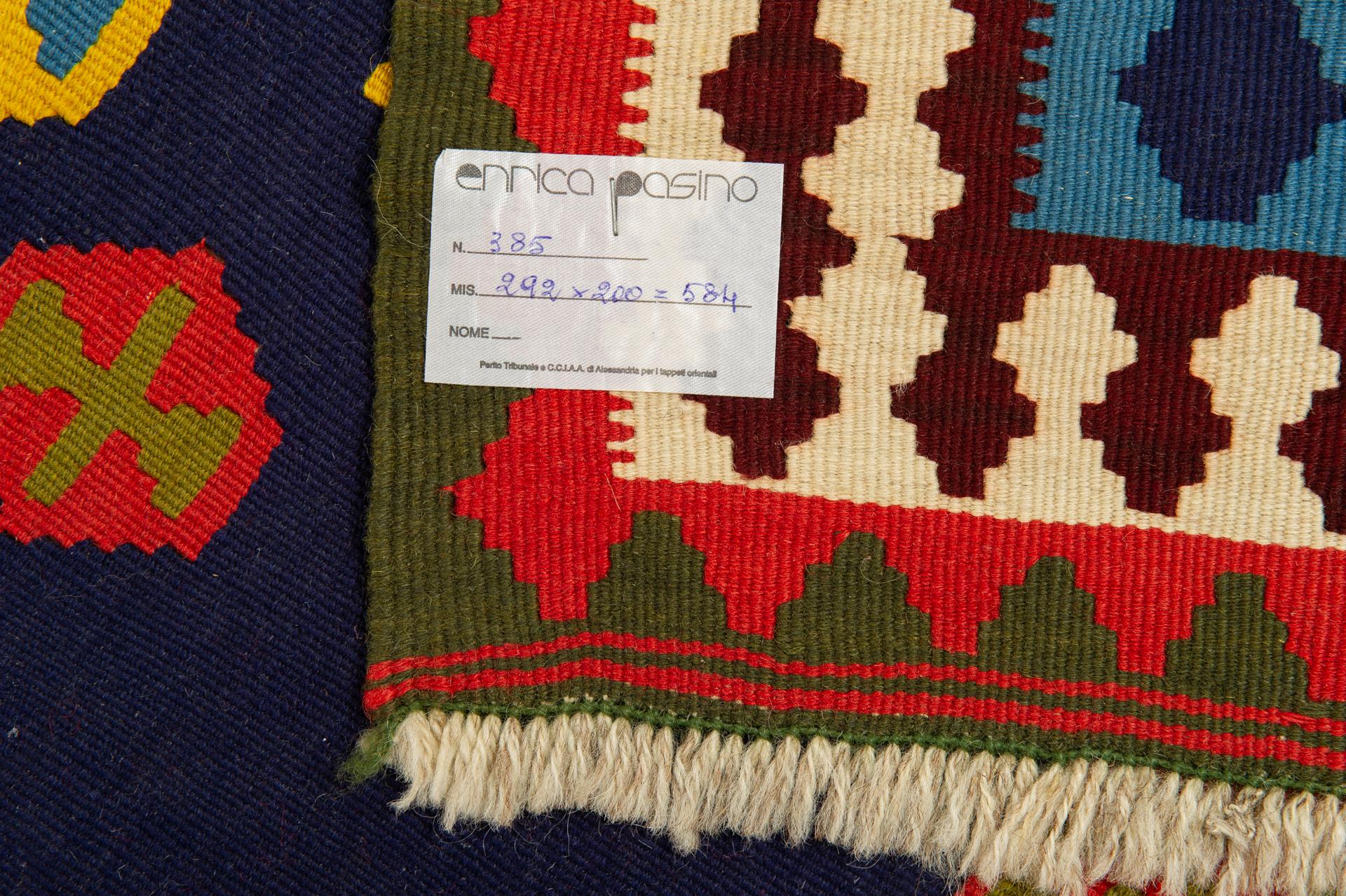 Wonderful kilim with a wonderful price. Beautiful cheerful colors on a blue background: to bring color and good humor to Your home. This had undoubtedly been the weaver's intention.