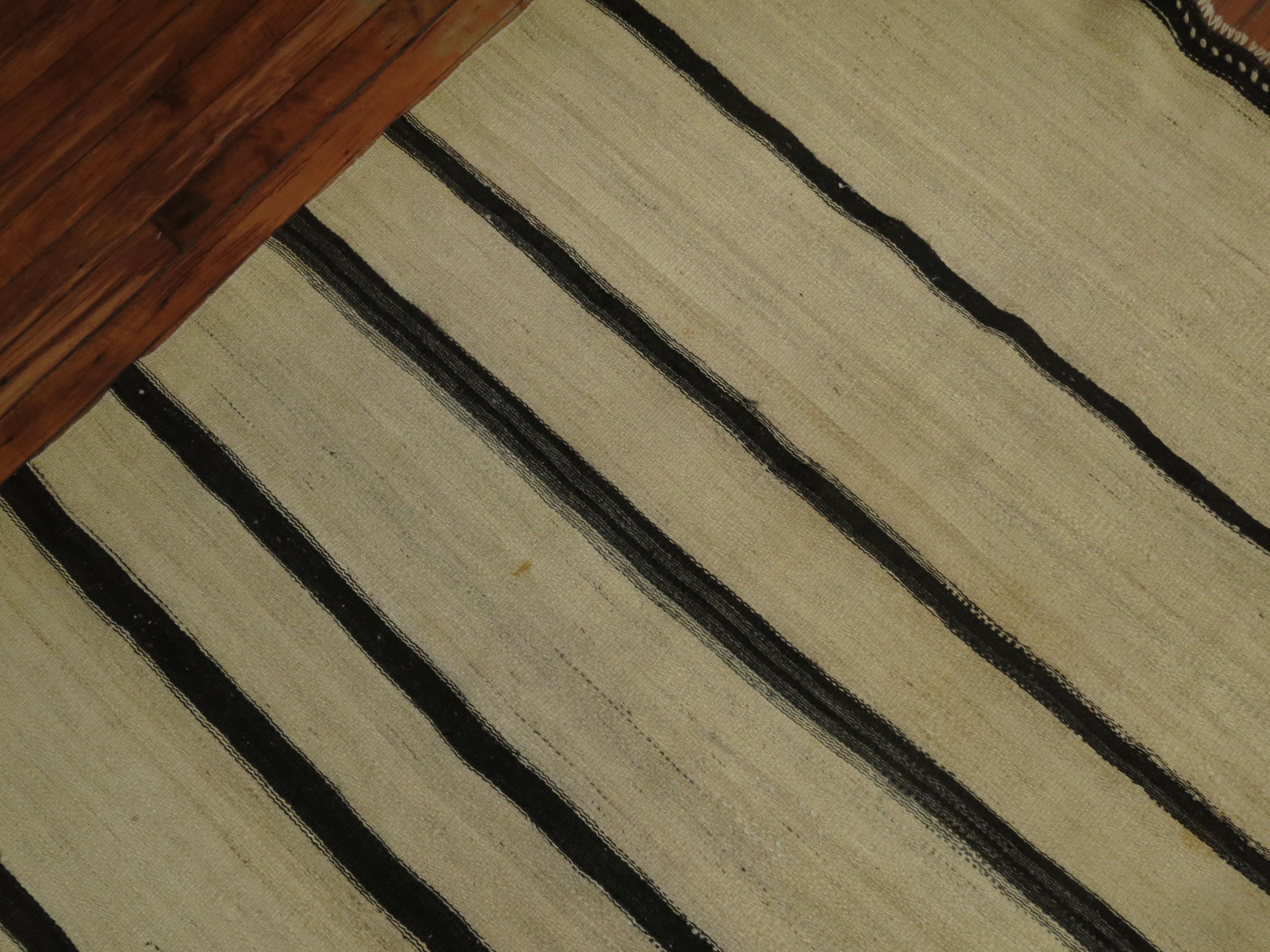 One of a kind handmade square size midcentury Turkish Kilim. Cream and dark brown. The stripes can go black too depending on the light in your room.