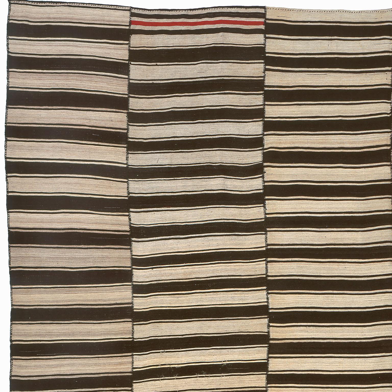 Vintage Kilim Composition composed of Persian panels circa 1940
Handmade black and white striped rug with red detail.