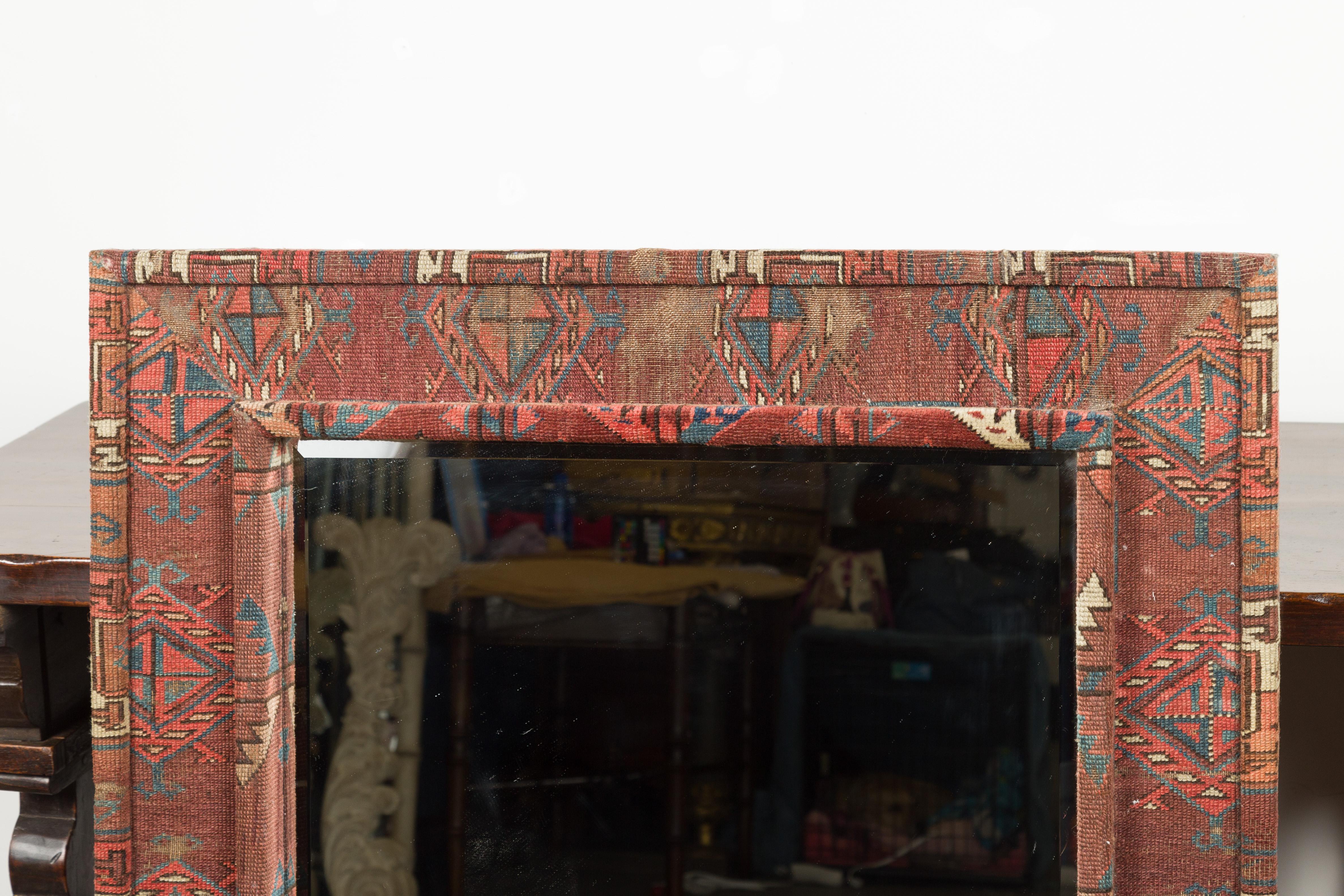 Vintage Kilim Covered Red, Blue and Beige Rectangular Mirror with Beveled Glass In Good Condition In Atlanta, GA