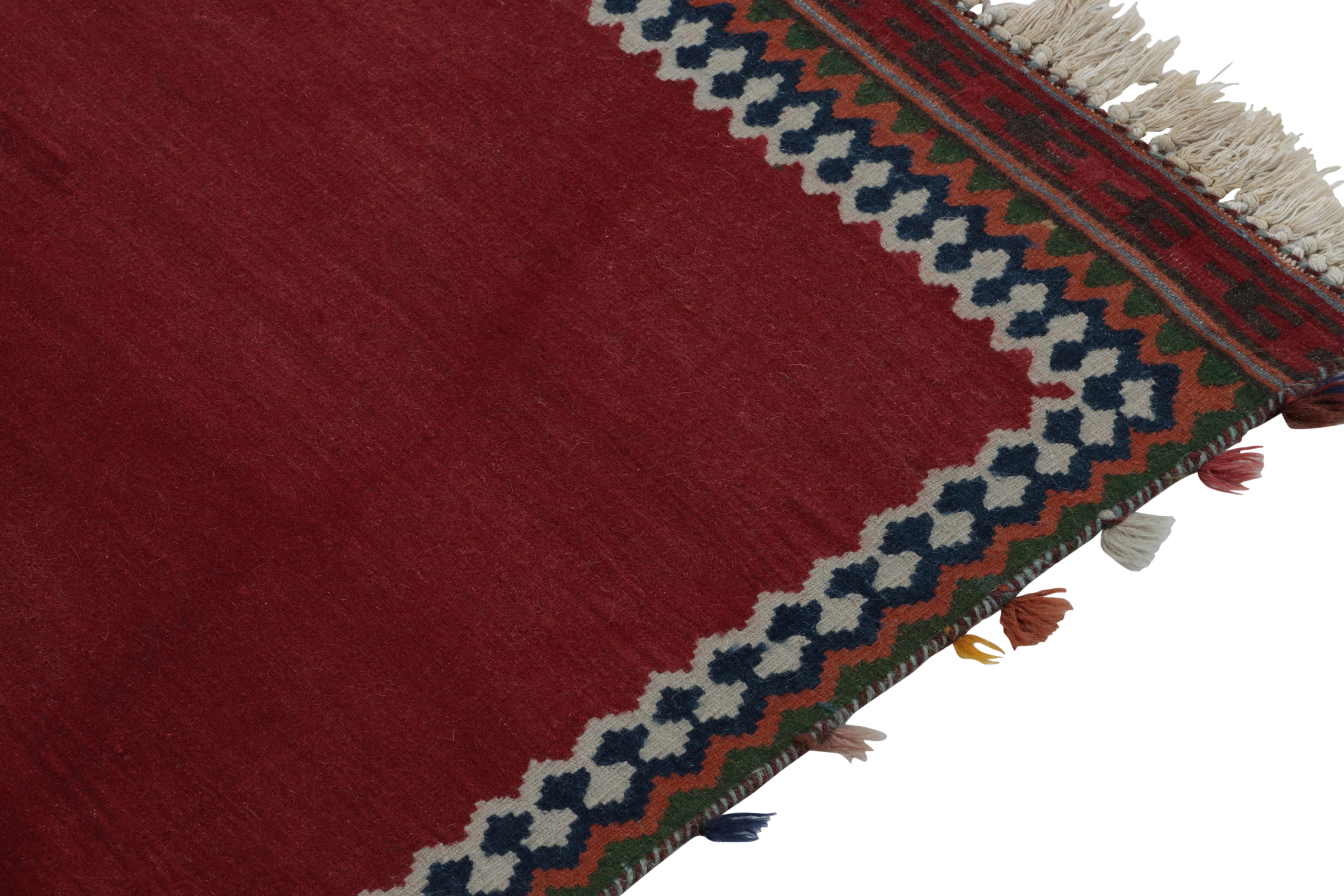 Vintage Kilim Red Open Field with Multicolor Geometric Border by Rug & Kilim In Good Condition For Sale In Long Island City, NY