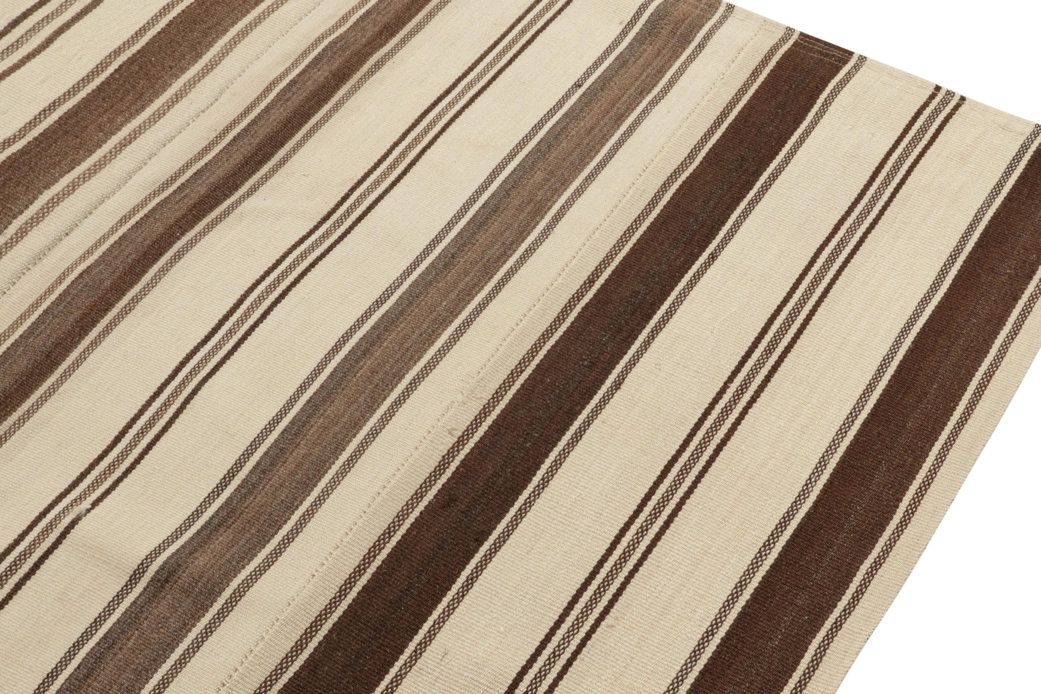 Mid-20th Century Vintage Kilim Rug in Beige, Brown Paneled Style, Striped Pattern by Rug & Kilim For Sale