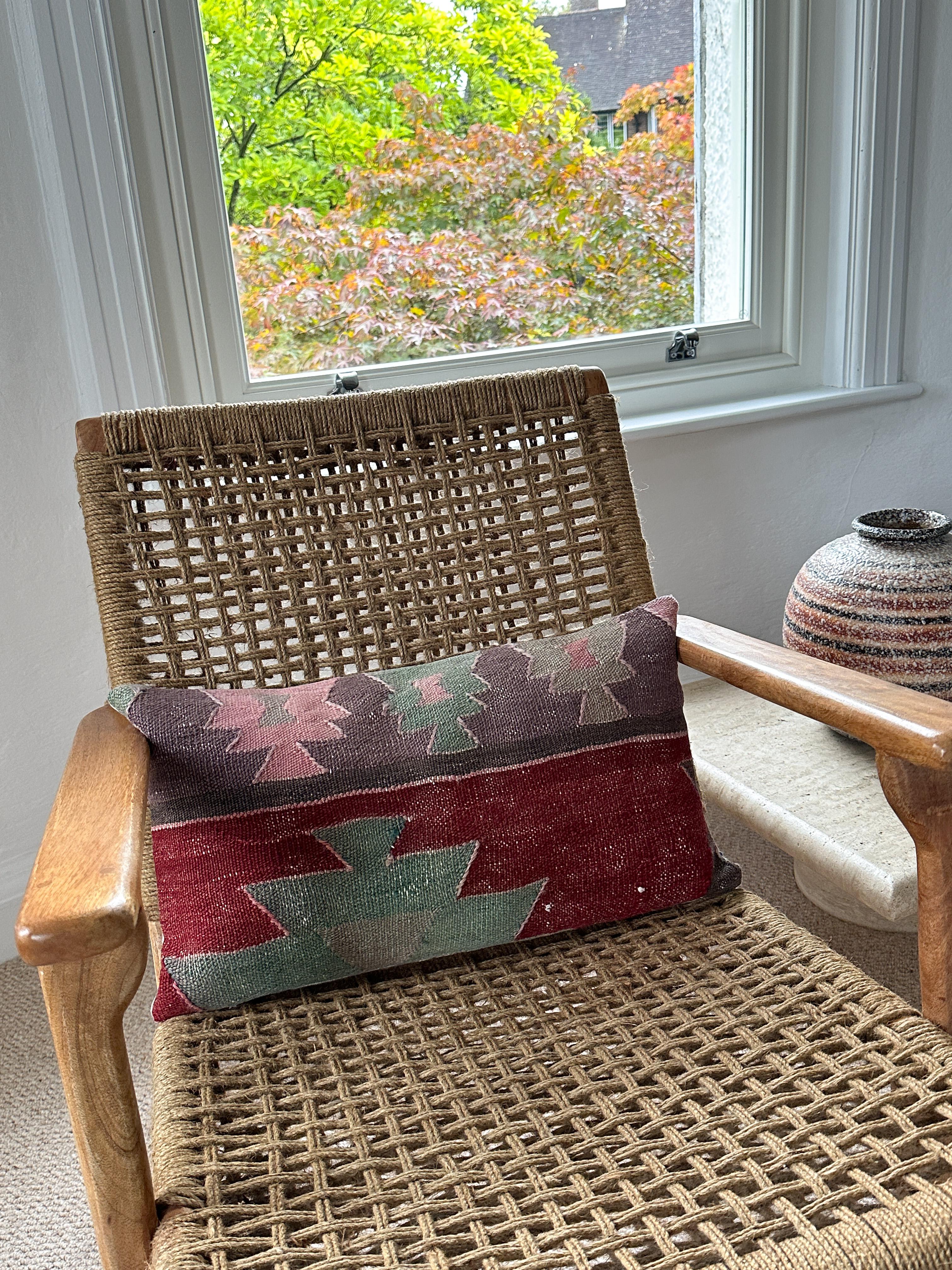 Title:
Vintage Kilim Rug Pillow with Irish Linen Cushion Rust Pink Purple Green

Luxury pillow created from an exquisite piece of vintage kilim rug combined with Irish Linen by Irish designer Katie Larmour. Unique and one-of-a-kind. 

In rich, warm,