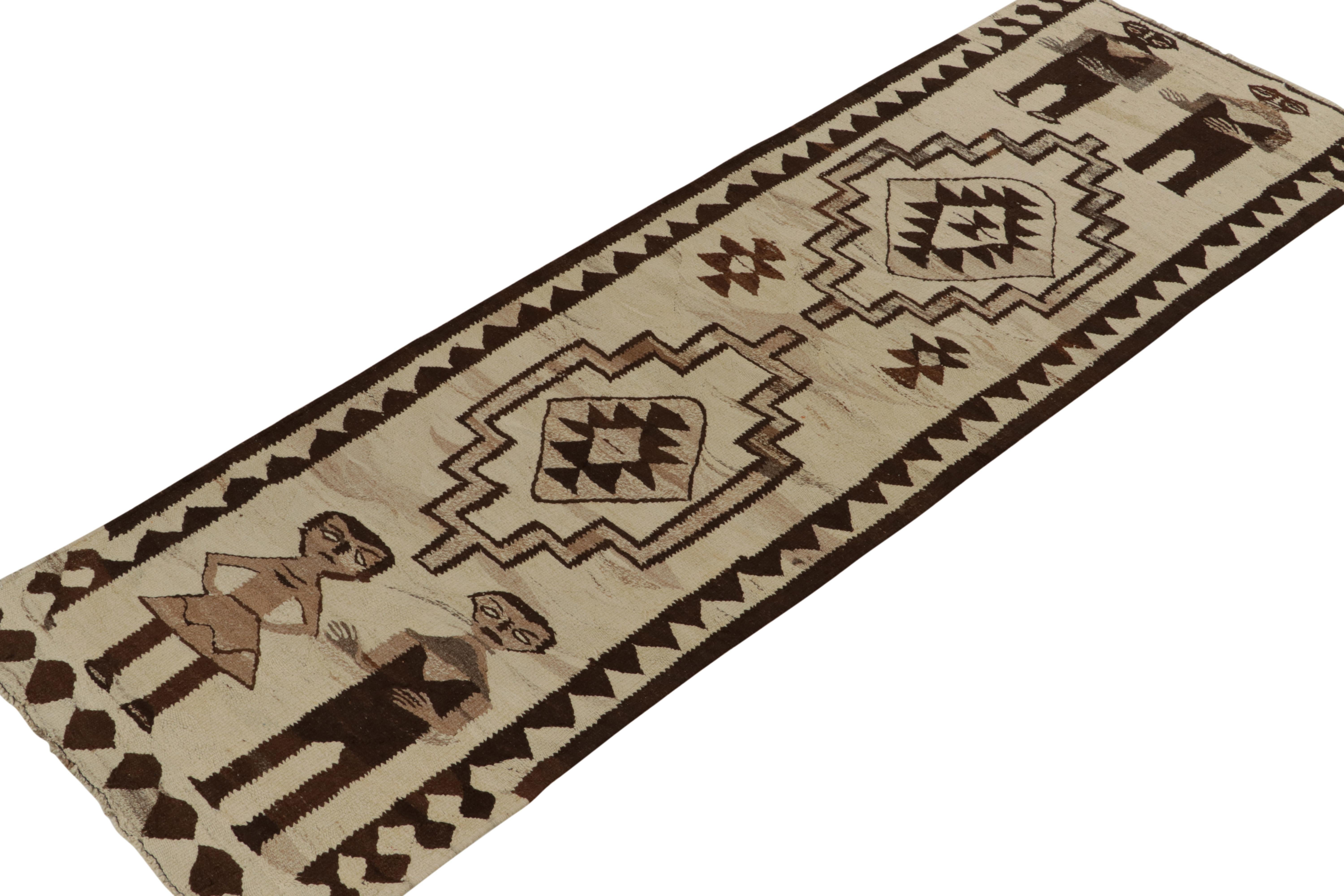 From Rug & Kilim Principal Josh Nazmiyal’s latest acquisitions, a stunning 3x10 vintage kilim runner originating from Turkey circa 1950-1960. 

On the Design: An earthy play of beige-brown tones depict a sharp series of tribal medallions and