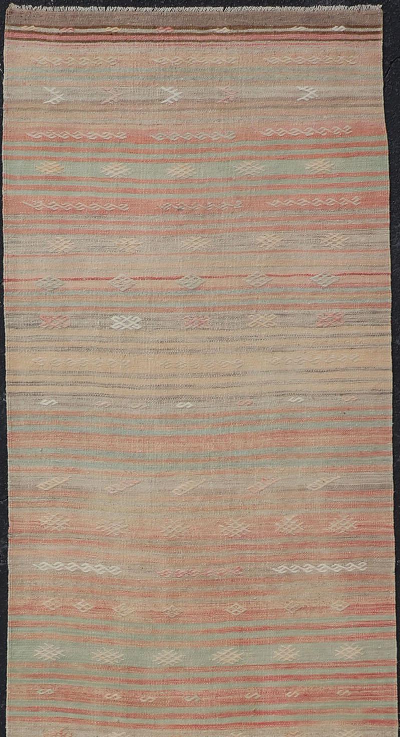 Hand-Woven Vintage Kilim Runner with Stripes and Geometric Tribal Motifs in Light Tones For Sale