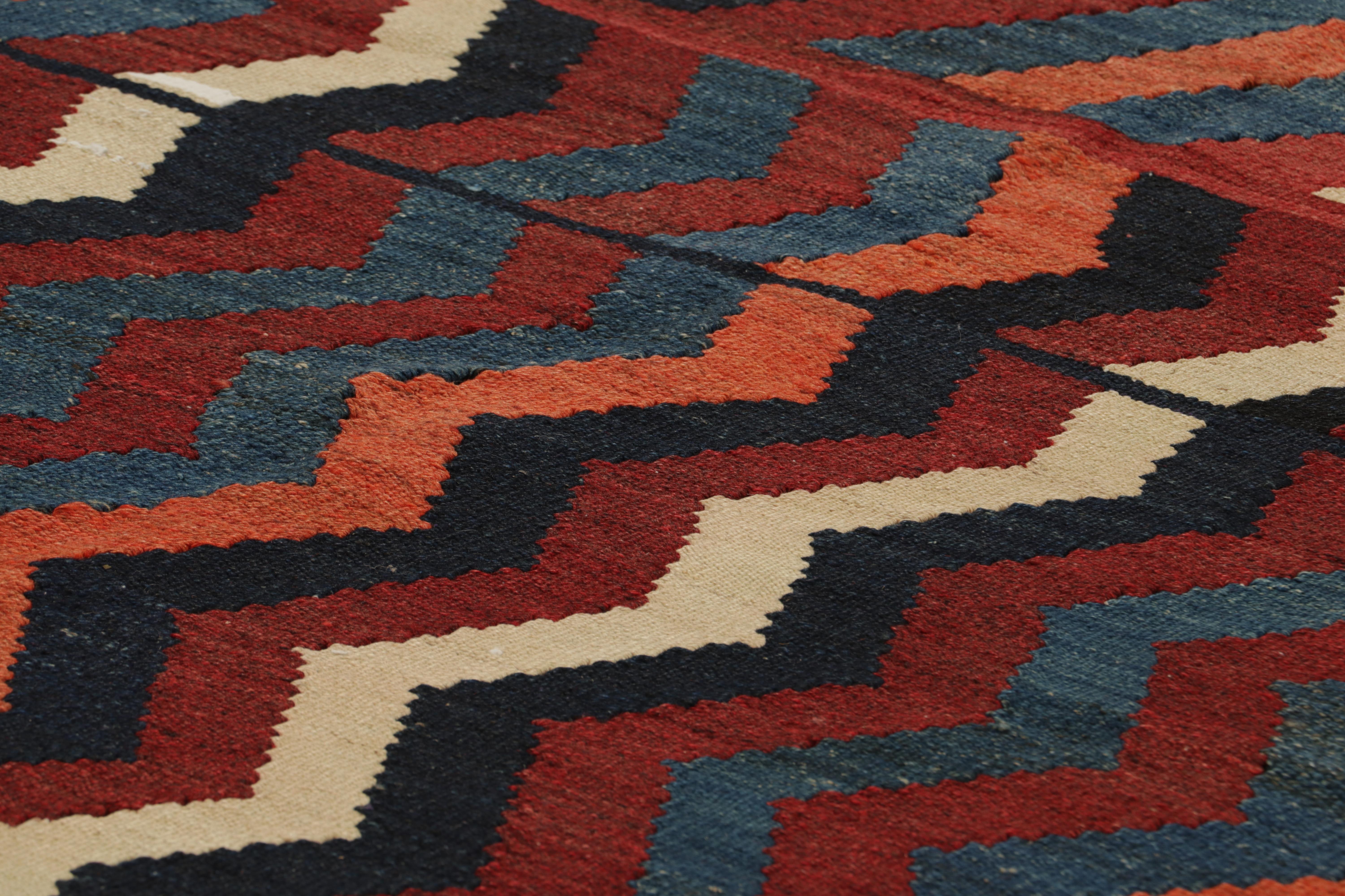 Handwoven in wool, circa 1950-1960, this 4x8 vintage Turkish kilim, is a collectible piece featuring polychromatic geometric chevrons and stripes. 

On the Design: 

Connoisseurs will admire this personal vintage piece meant to catch the eye, yet