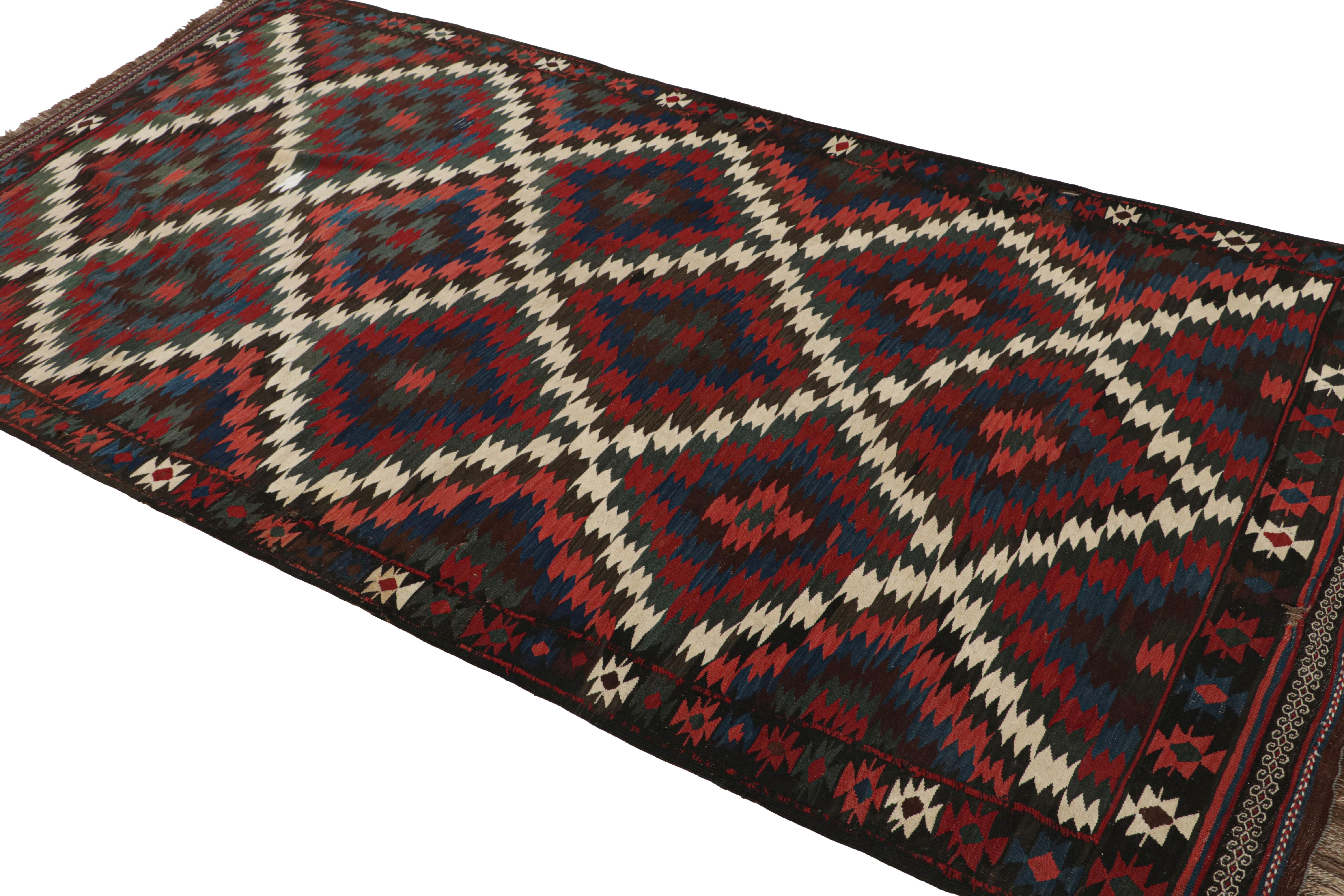 Handwoven in wool and originating from Turkey 5x10 circa 1950-1960, its polychromatic colorway enjoys a quite traditional emphasis of rich colors.  

On the Design: 

Connoisseurs may admire its colorway is a rich range of, namely deep reds, browns,