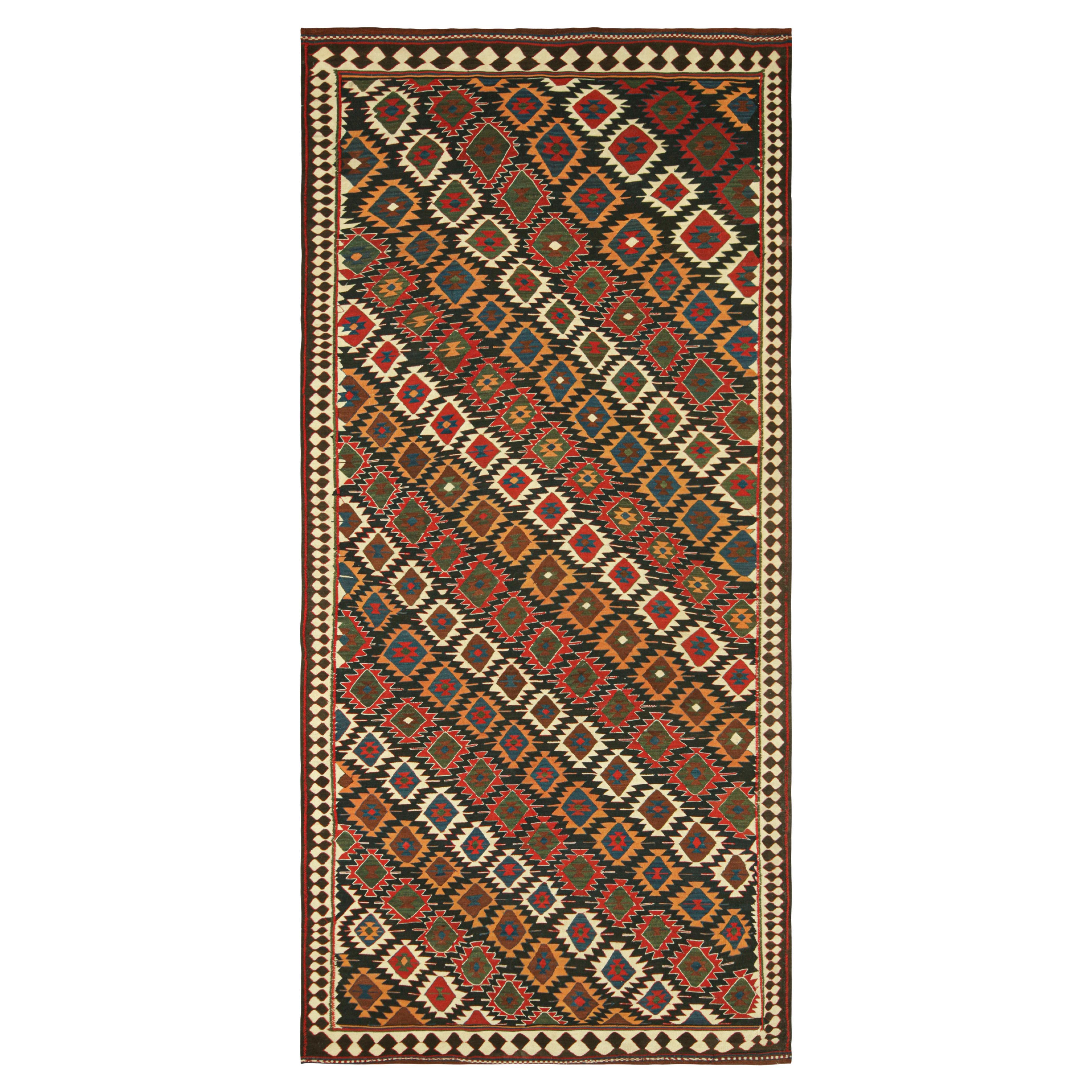 Kilim vintage à motifs géométriques tribaux, de Rug & Kilim
