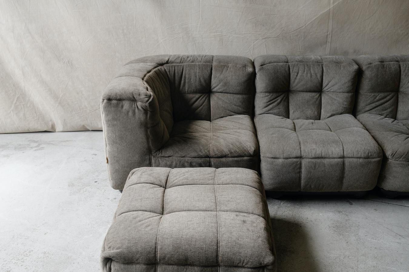 Vintage Kimba Sofa By Michel Ducaroy For Ligne Roset, France, Circa 1970.  Original grey linen upholstery in very good condition with light wear and use.  Manufactured by Ligne Roset, France.

We don't have the time or energy to write an extensive