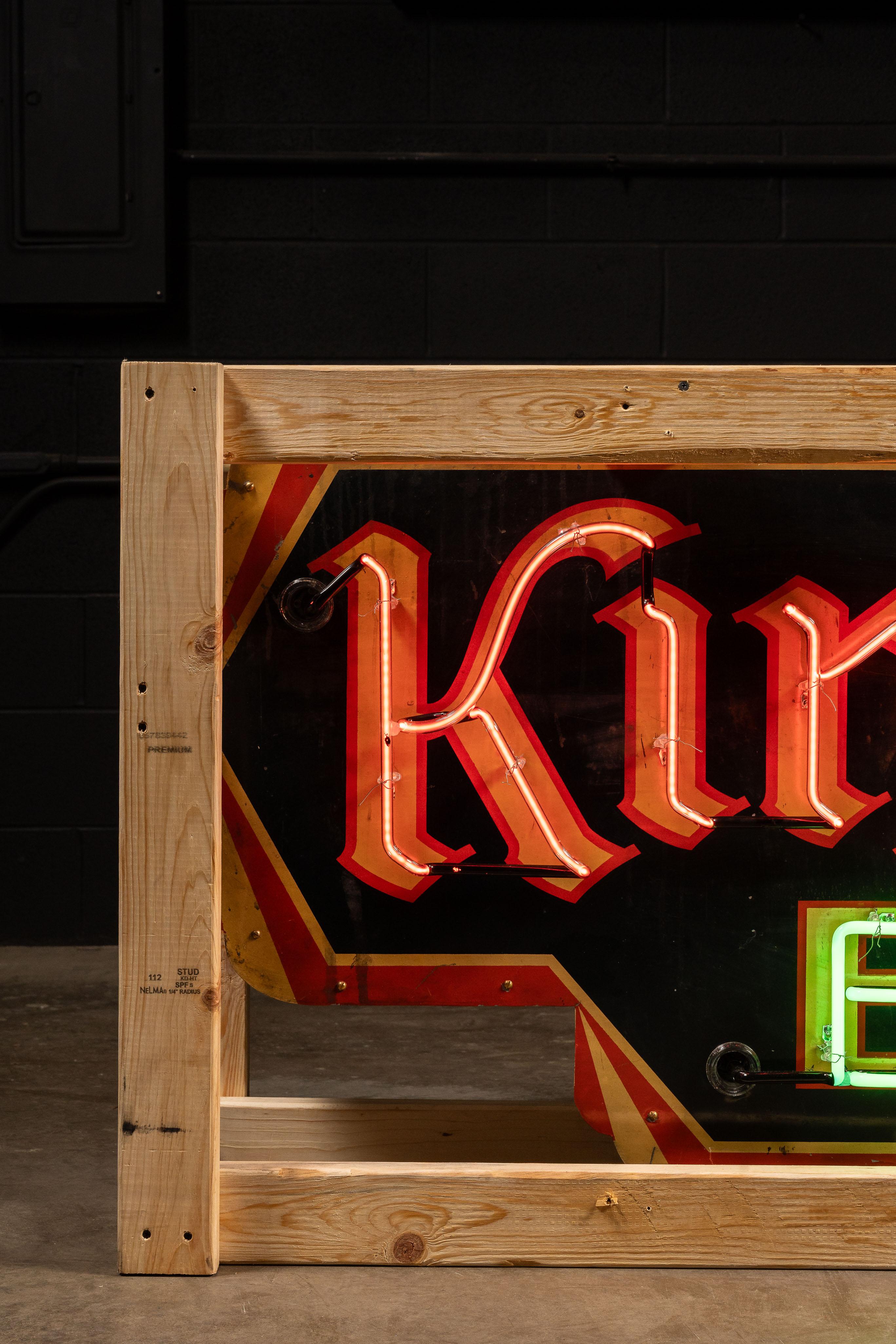 Tin base neon sign advertising King Cole Beer, brewed by The King Cole Brewing Company, Chicago Heights, IL. This sign was manufactured by The Huber Neon Sign Co. in Chicago and features the brand's logo outlined in red and green neon.

83