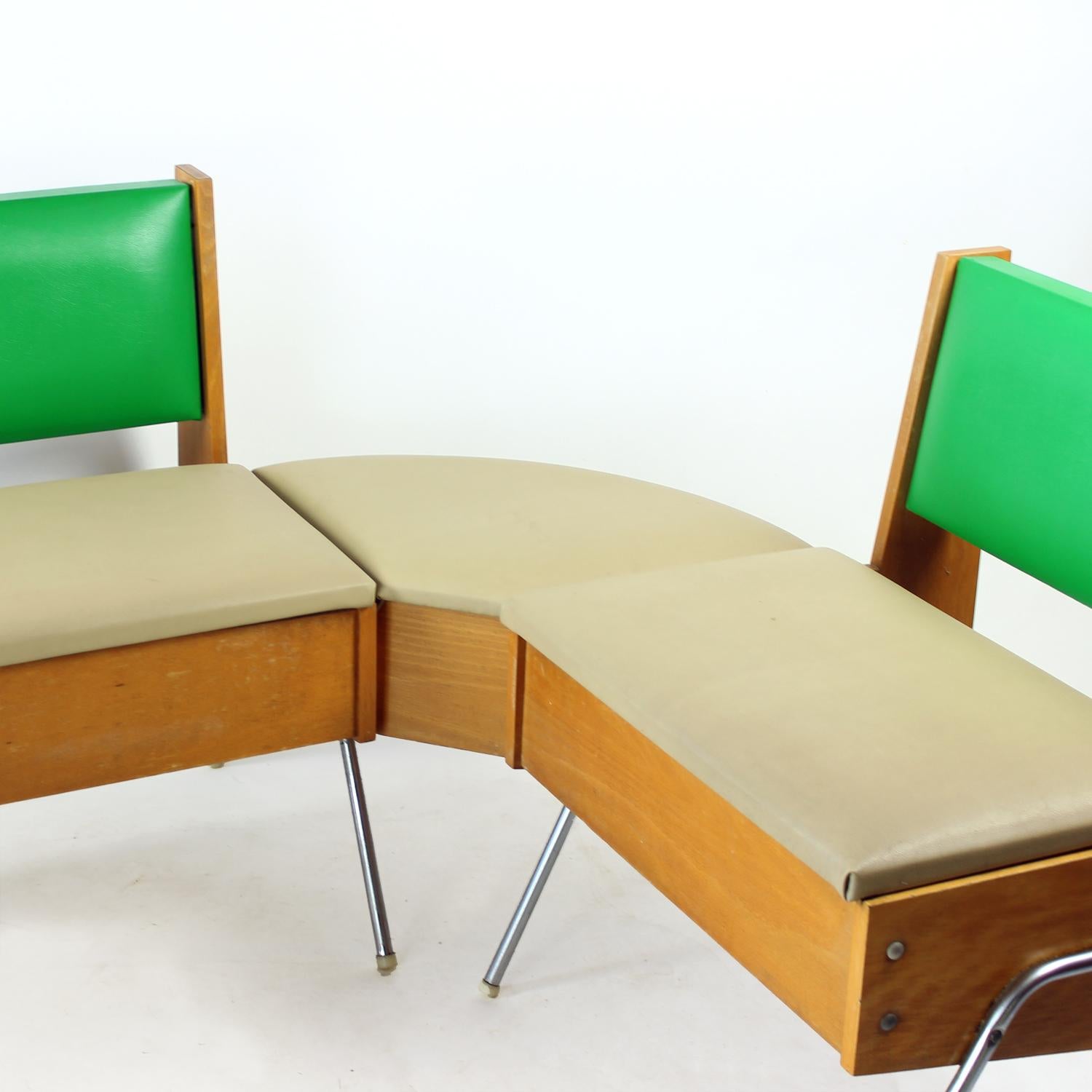 This charming and practical bench set dates back to the 1960s and was originally used in kitchens across Czechoslovakia. Produced by the renowned Kovona company, the set features a sturdy chrome steel frame and original green and beige leatherette