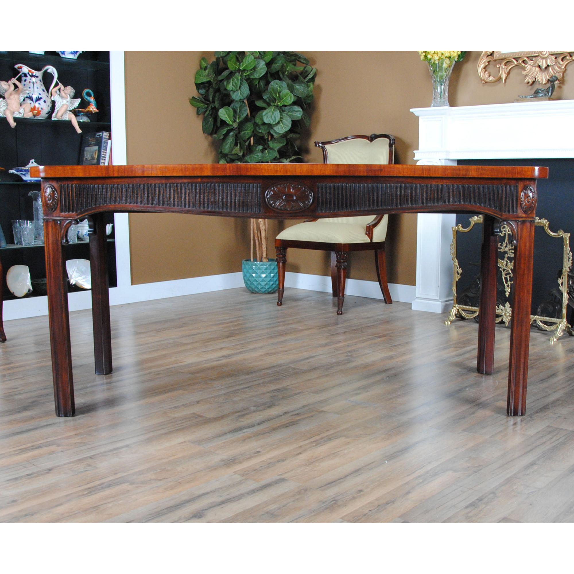 The absolute highest quality piece of American furniture production is exemplified in this Vintage Kittinger Mahogany Console. From the recently French polished top to the base of the sturdy and beautifully shaped legs everything here works together