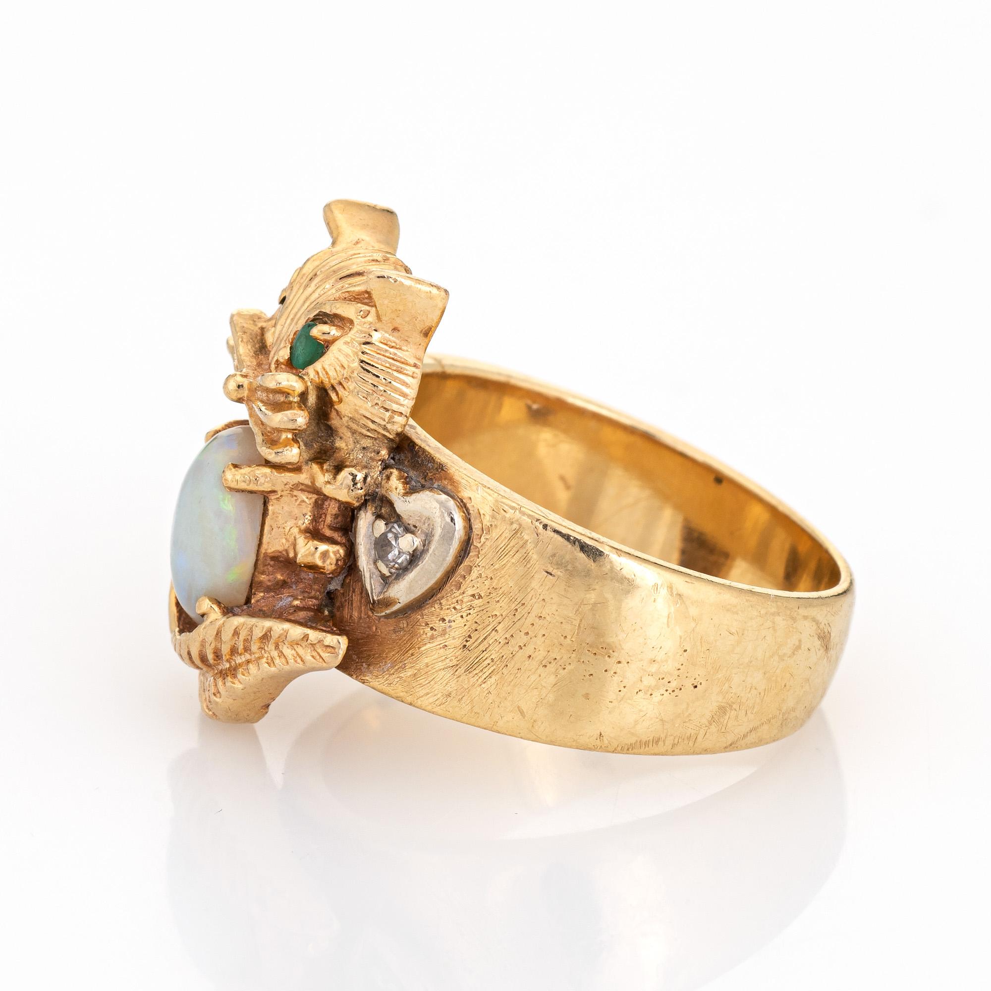gold cat ring with emerald eyes