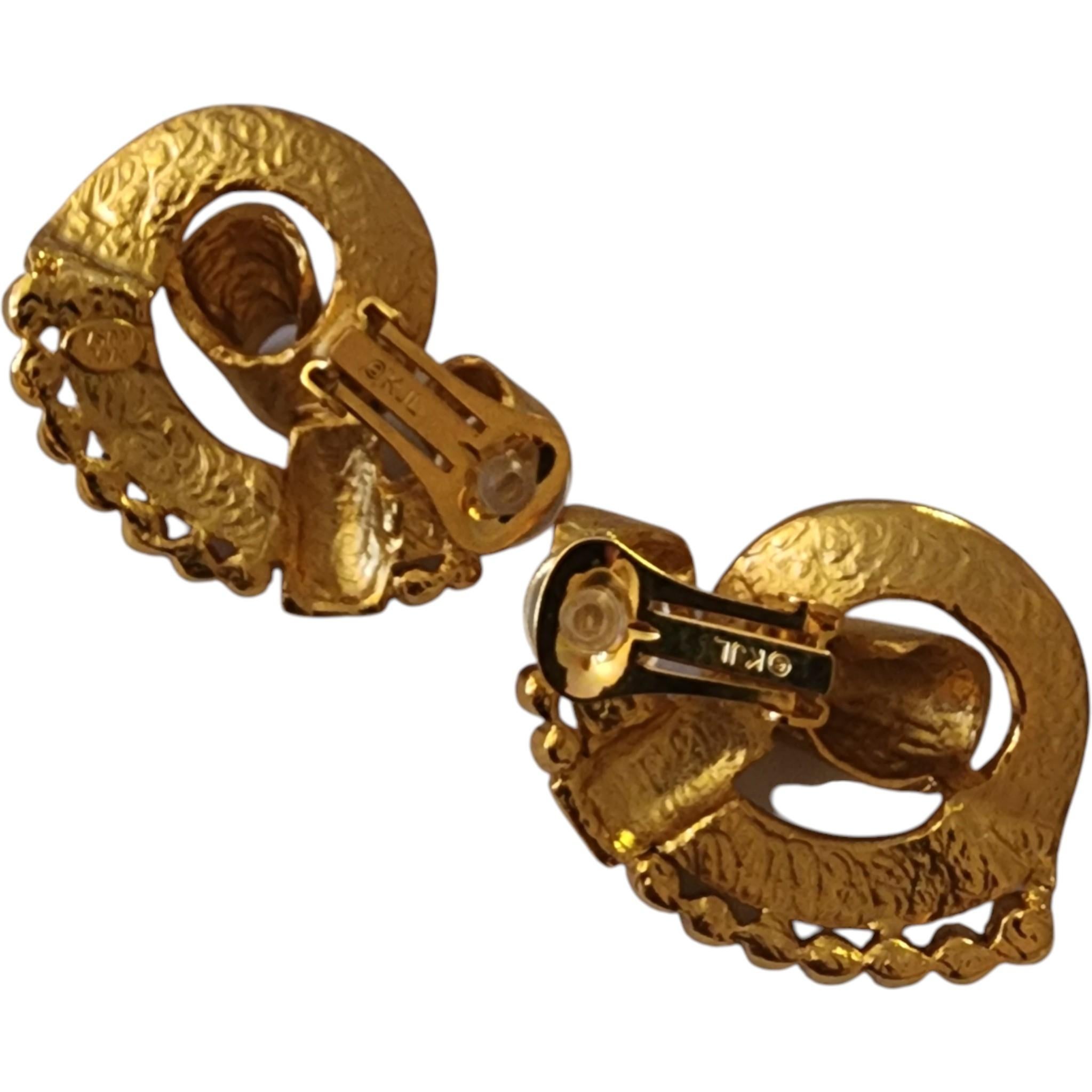 Vintage KJL Emerald Green Crystal Swirl Clip-On Ohrringe (Baguetteschliff)