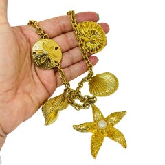 Vintage KJL for AVON signed gold tone designer sea shells starfish necklace