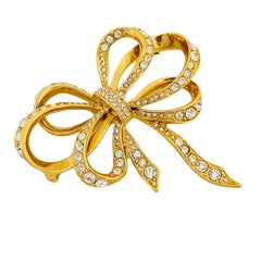 Vintage KJL for AVON signed gold tone rhinestone bow designer runway brooch