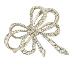 Vintage KJL for AVON signed silver tone rhinestone bow brooch