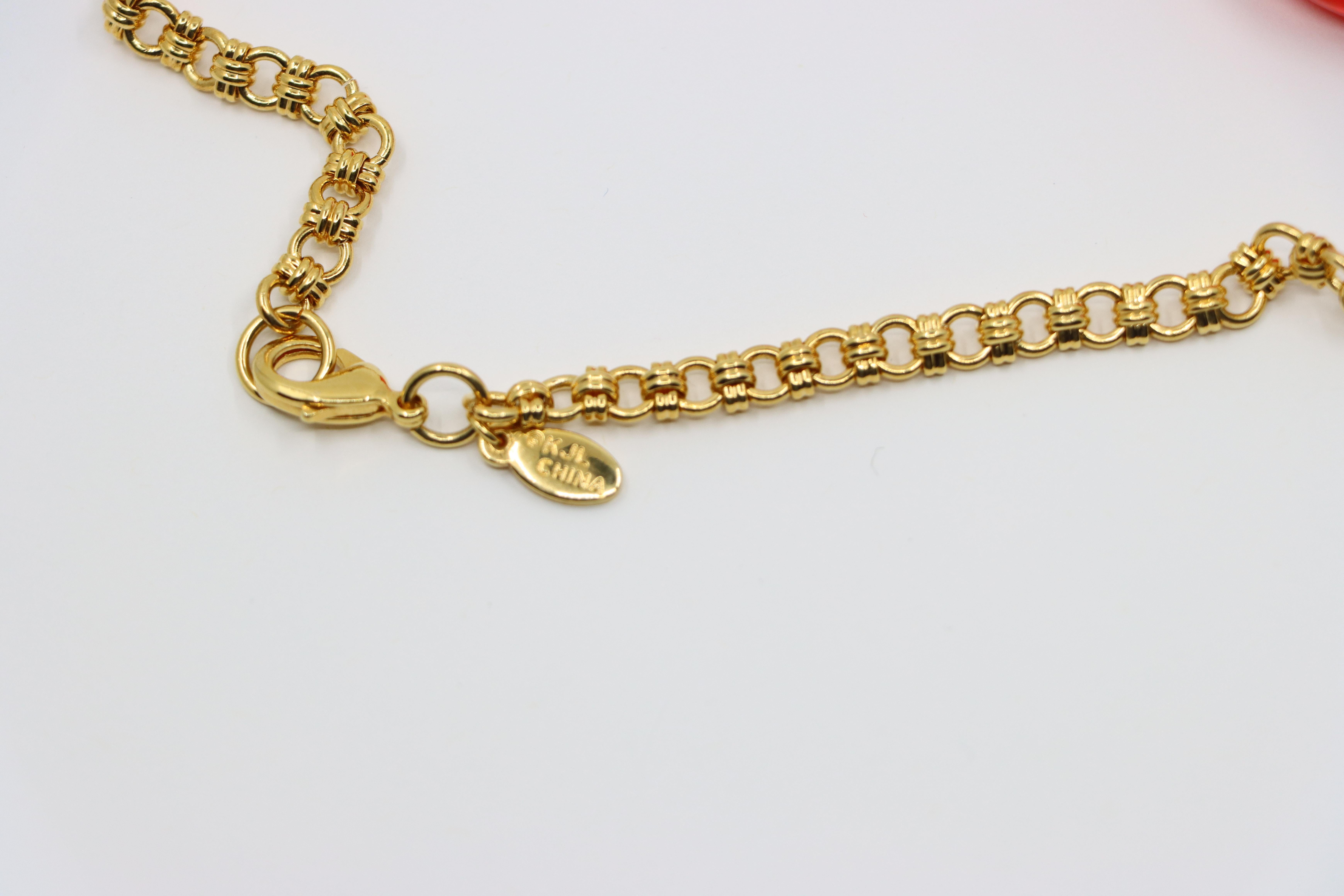 Vintage KJL Collana con catena in resina rossa e tonalità oro in vendita 6