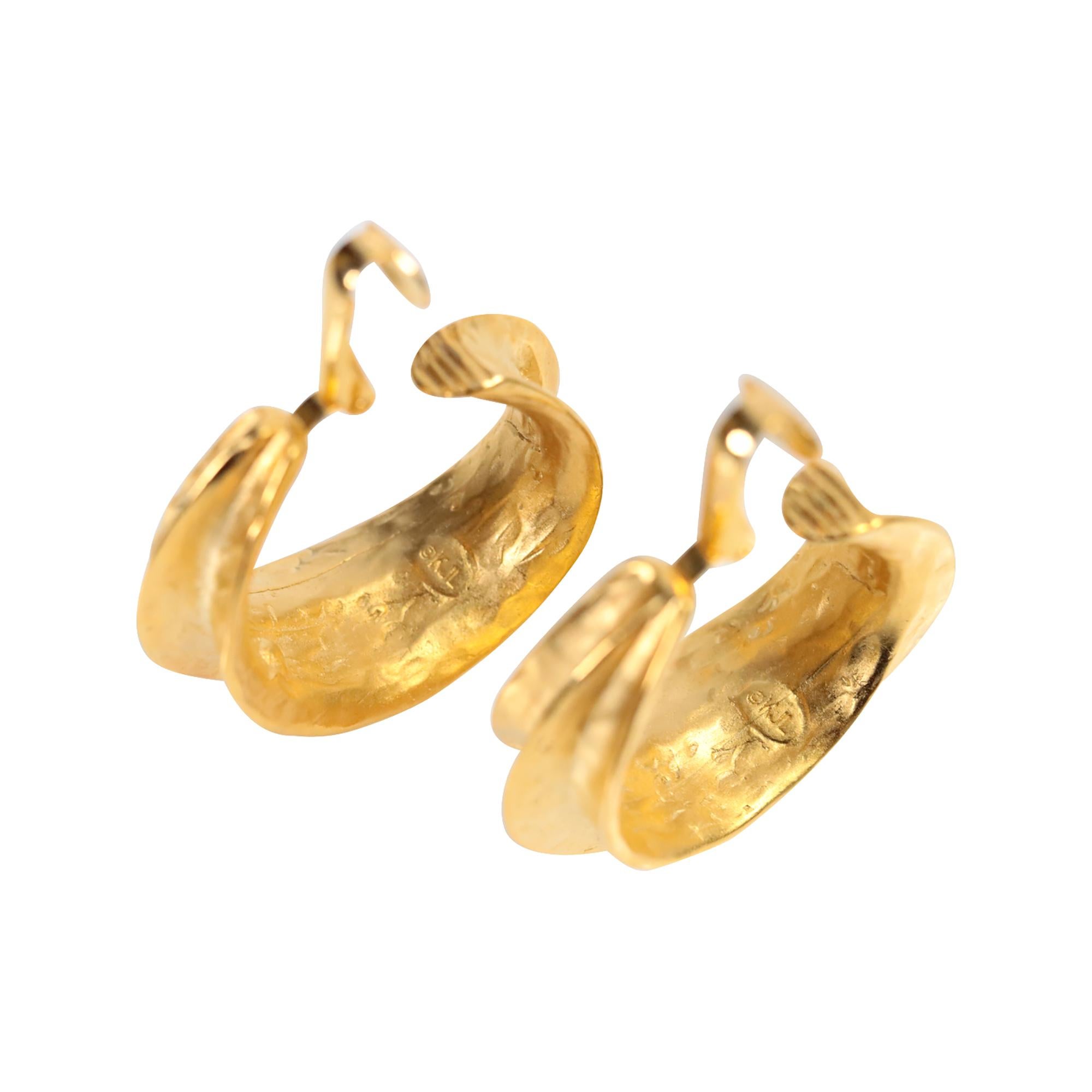 Vintage KJL Gold Tone Wider Hoop Earrings Circa 1990s. These earrings just have a look.  I don't have a lot of the newer KJL items on my curation, but these make the cut.  They appear to have a hammered look and a distinct layer to the hoop, almost
