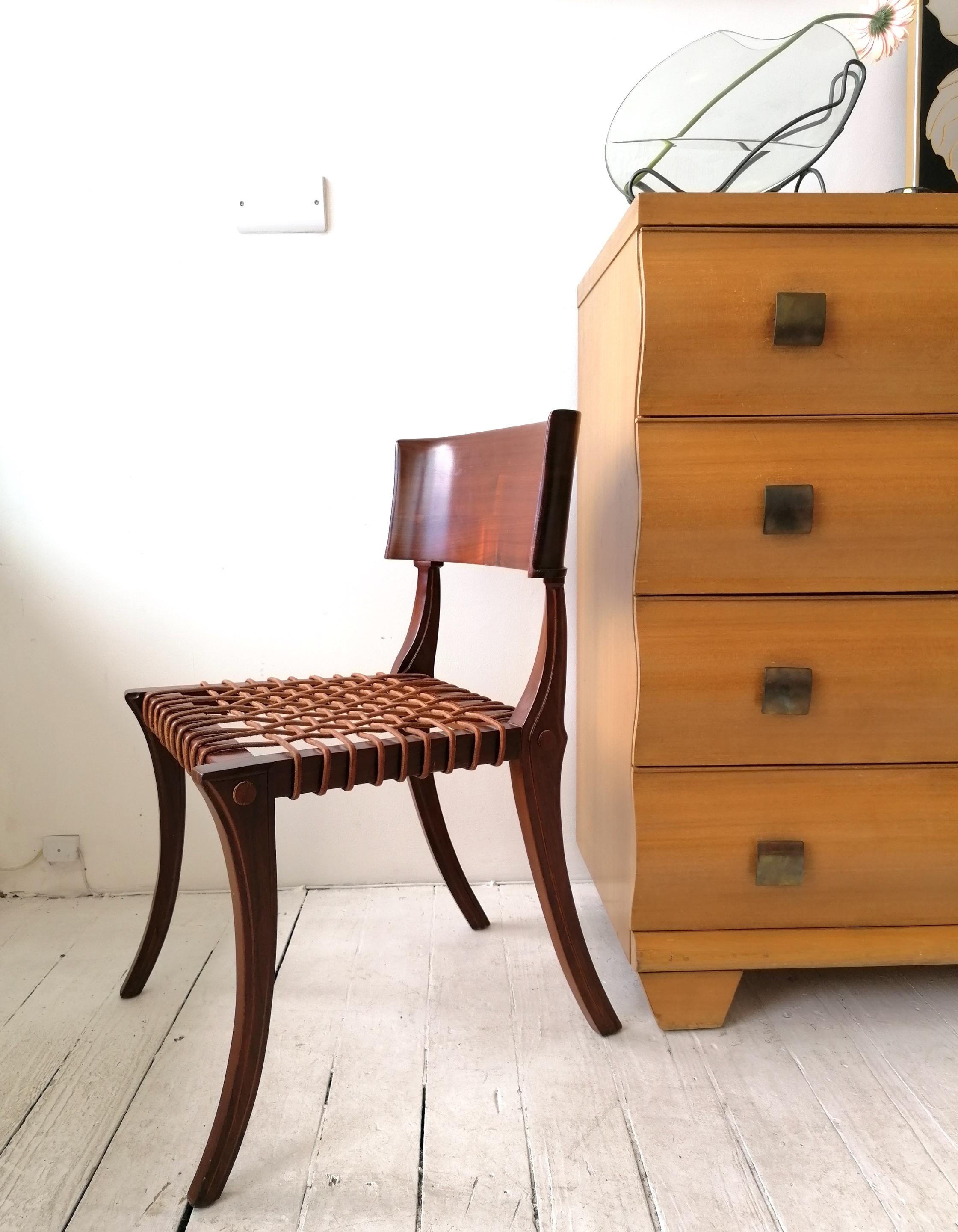 A rare vintage Klismos chair by T H Robsjohn Gibbings - this is the Bexley Heath edition for John Widdicomb. Fully labelled. Walnut with original leather cord seat. Excellent condition.
USA, 1980s/90s.
     