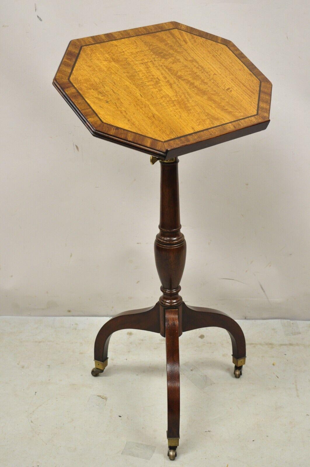 Vintage Knob Creek Mahogany & Satinwood Adjustable Lectern Book Stand. Item features an adjustable height, brass hardware, rolling casters, tripod base, beautiful wood grain, original label, quality American craftsmanship. Circa Late 20th Century.
