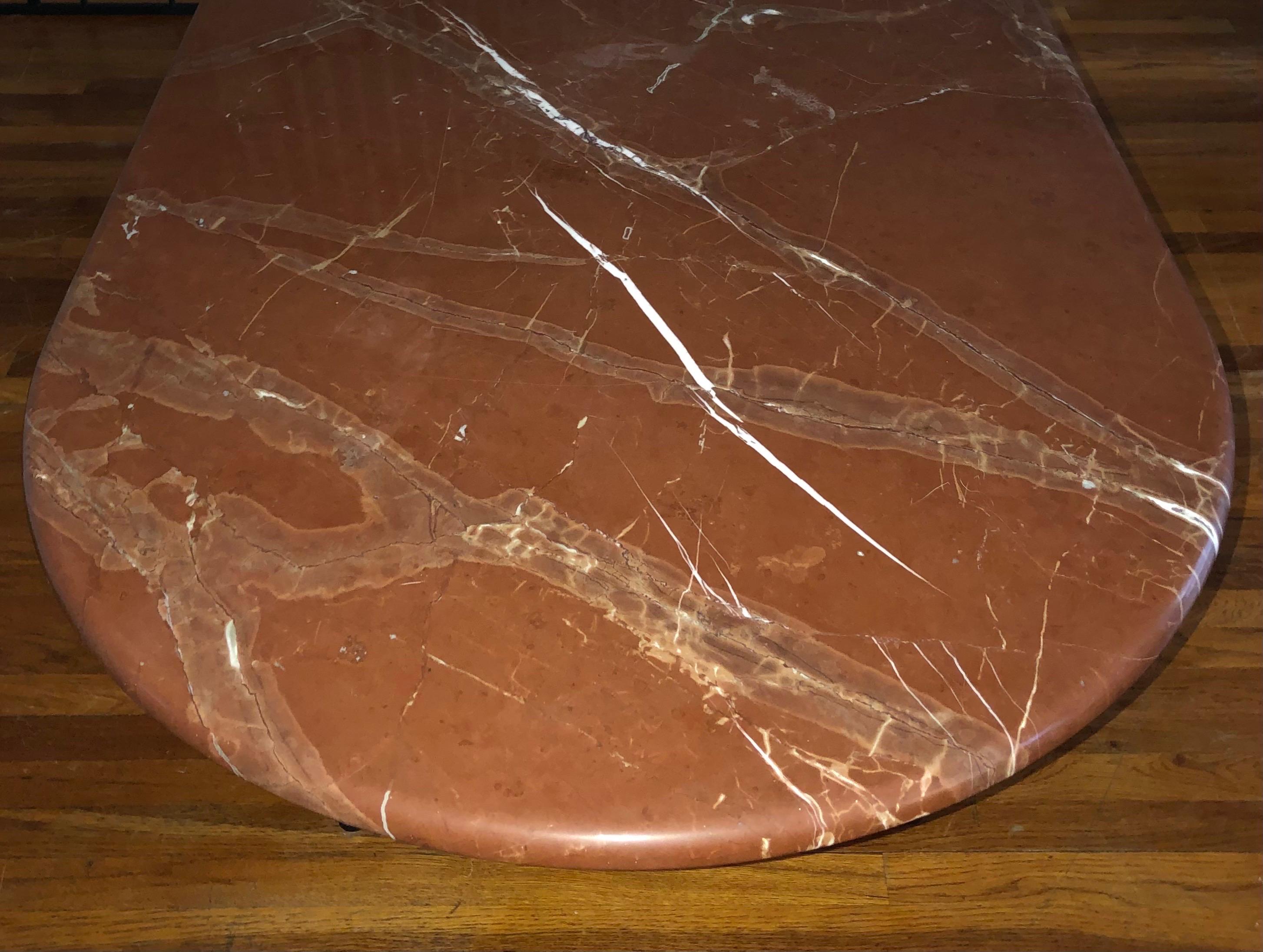 Rare Spanish Rojo Alicante marble dining table by Knoll.

Great as a dining table, a desk or a conference table.

Rojo Alicante is a classic red marble from the Iberic Peninsula that has been quarried for hundreds of years.

The stone has some