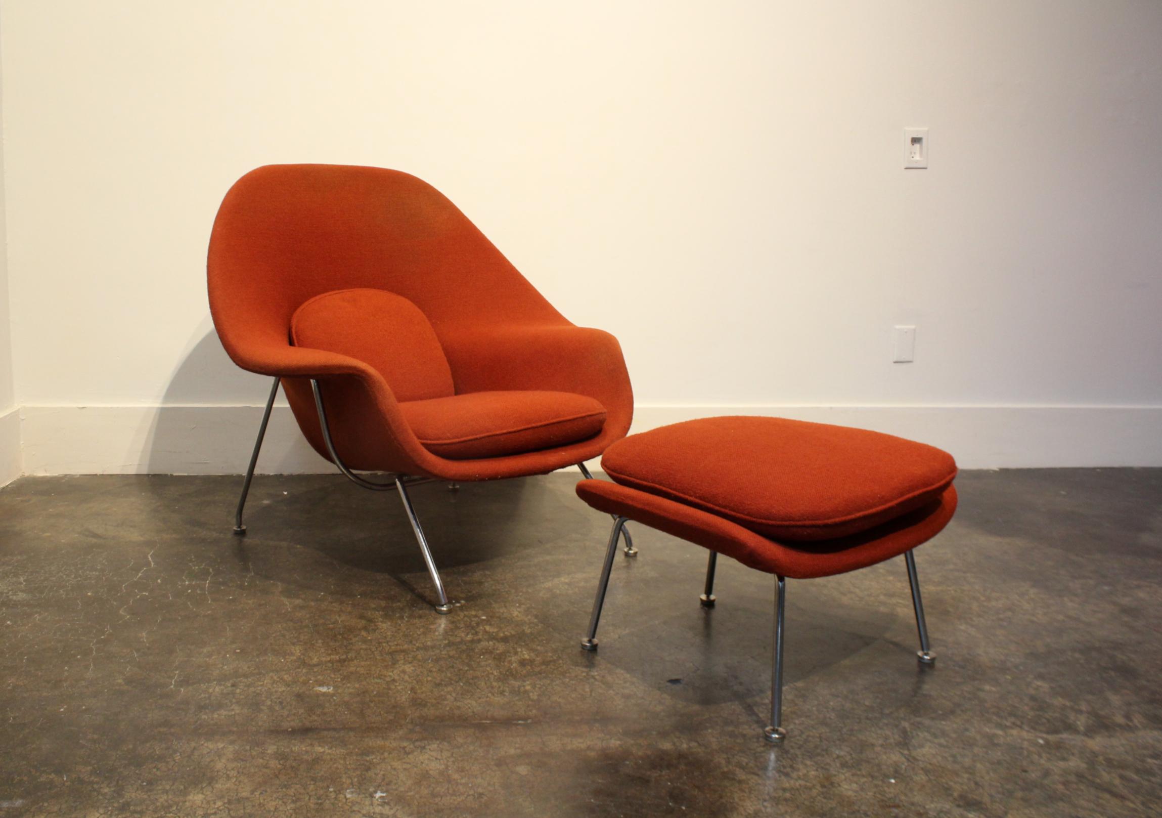 Vintage Knoll Eero Saarinen womb chair and ottoman. Labels date it to the 1960s. Beautiful original upholstery in rust orange/red. Signs of wear consistent with age and use.

Dimensions: 

Chair 37.5