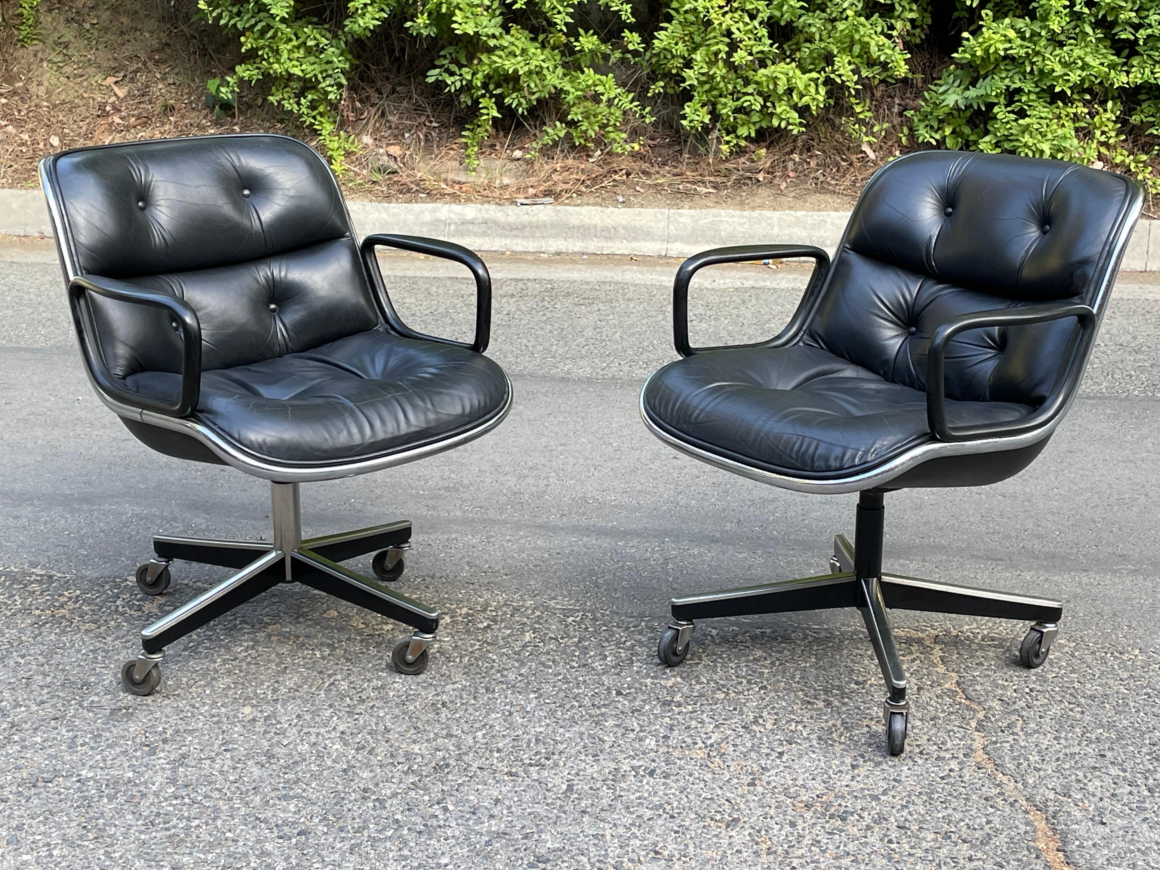 Gorgeous PAIR of vintage original black leather Pollock desk chairs designed by Charles Pollack for Knoll. Features original black leather in very good original condition.

On 4-star chrome pedestal bases. With Knoll label underneath.

PRICE IS FOR