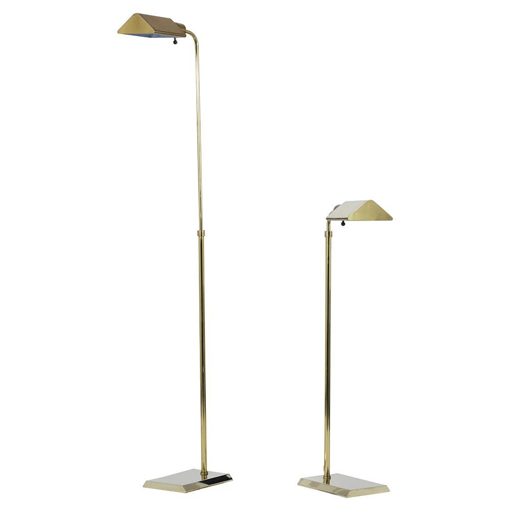 A pair of Mid-Century Modern floor lamps crafted out of brass in the style of Koch & Lowy, has been cleaned/polished giving them a beautiful polished patina finish. The lamps feature an adjustable swivel neck, adjustable brass shade, and its